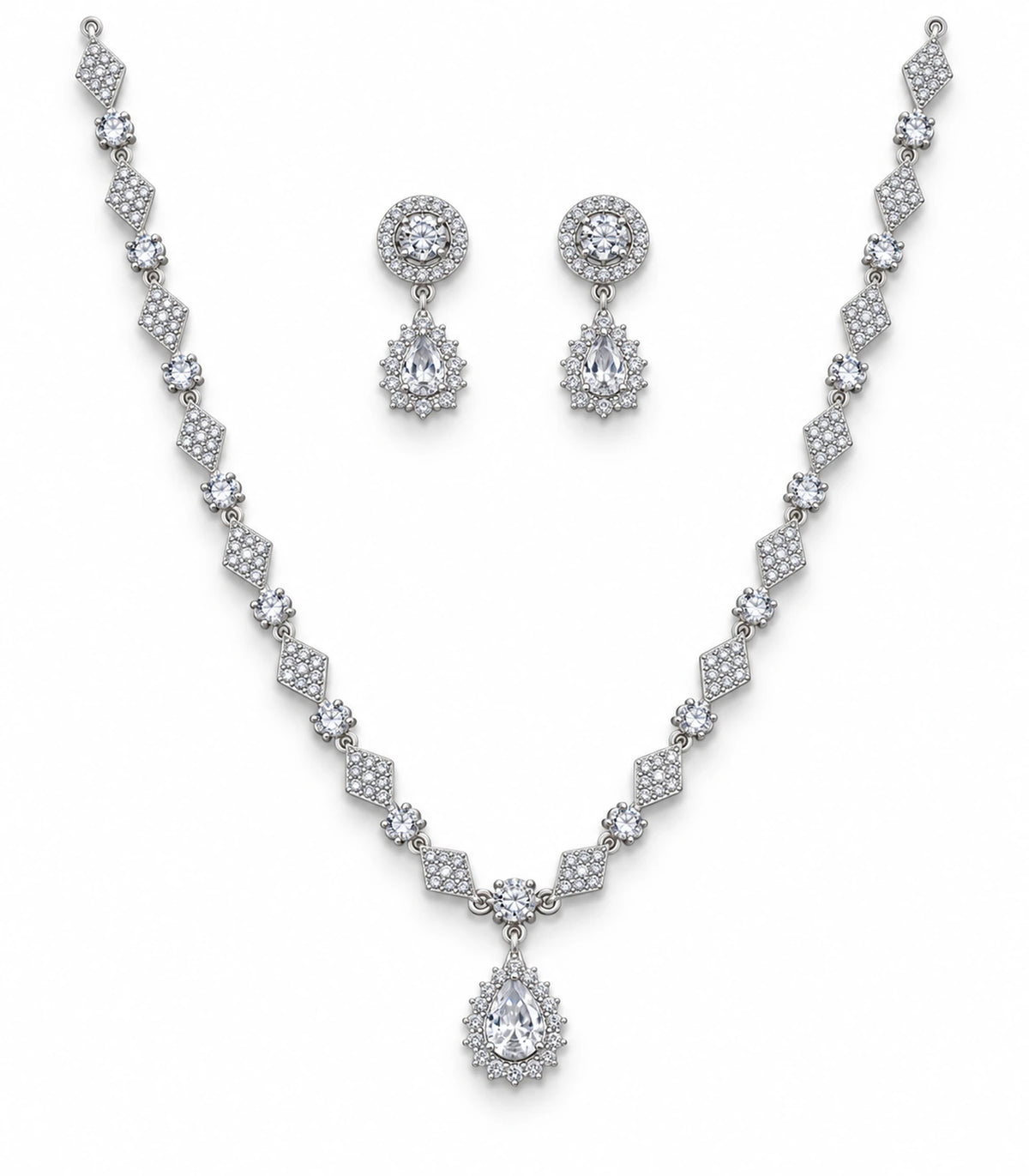 Silver-tone clear necklace set with matching pair of teardrop drop earrings on white