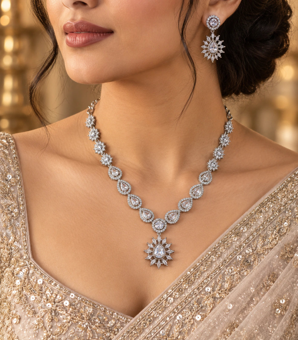 Silver Clear Teardrop Sunburst Crystal Necklace Set worn in a three-quarter editorial view
