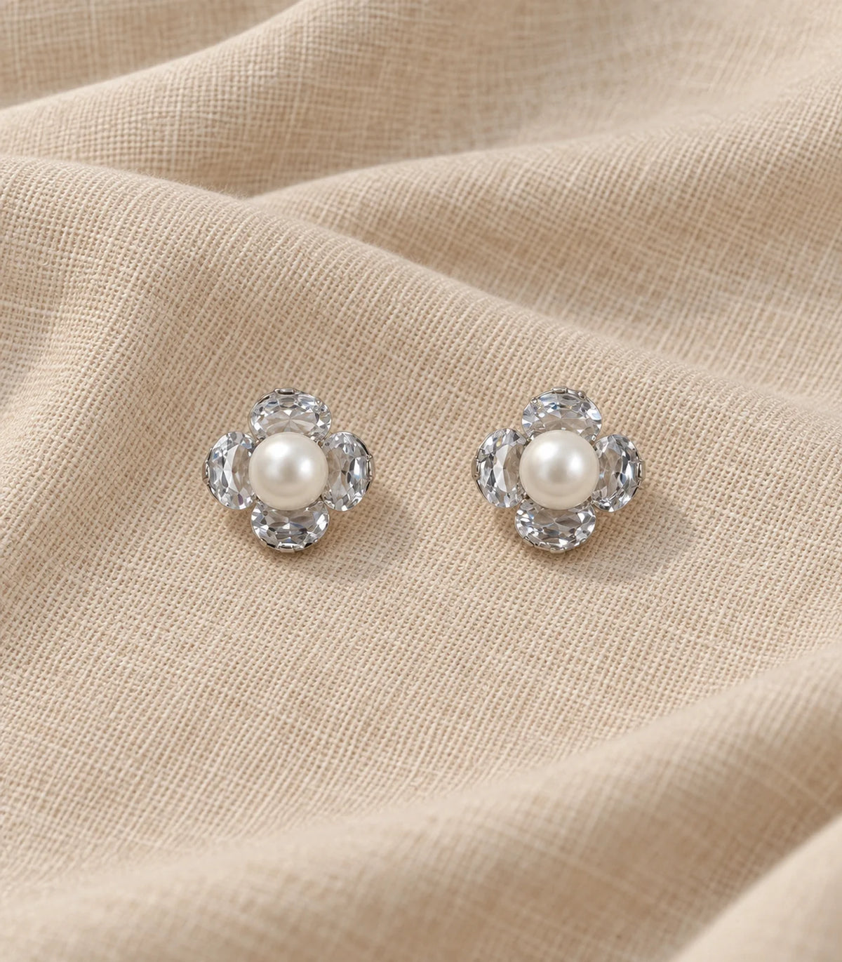 JIMIKI silver four-petal crystal flower pearl stud earrings - editorial-flatlay #color_silver