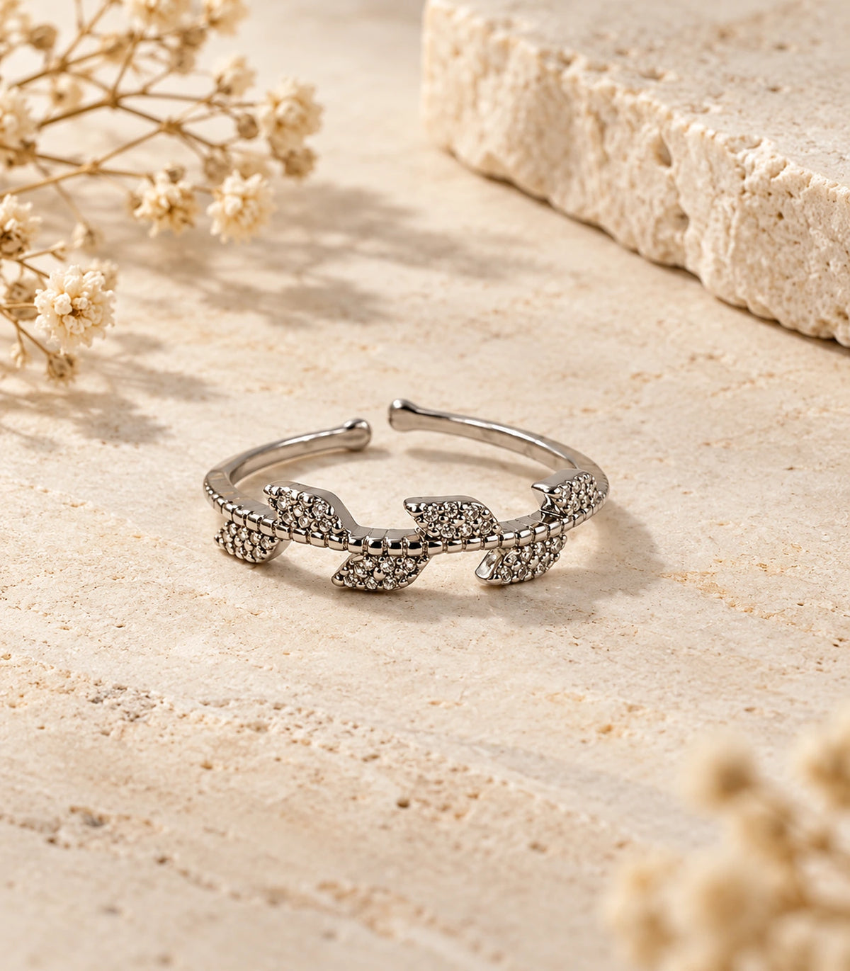 JIMIKI Silver Crystal Leaf Branch Ring in Silver - editorial flatlay #color_silver