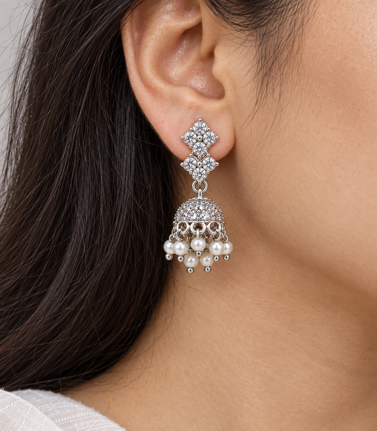 JIMIKI Silver Double Diamond Crystal Jhumka Earrings - Close-up of the double diamond top and embellished bell #color_silver