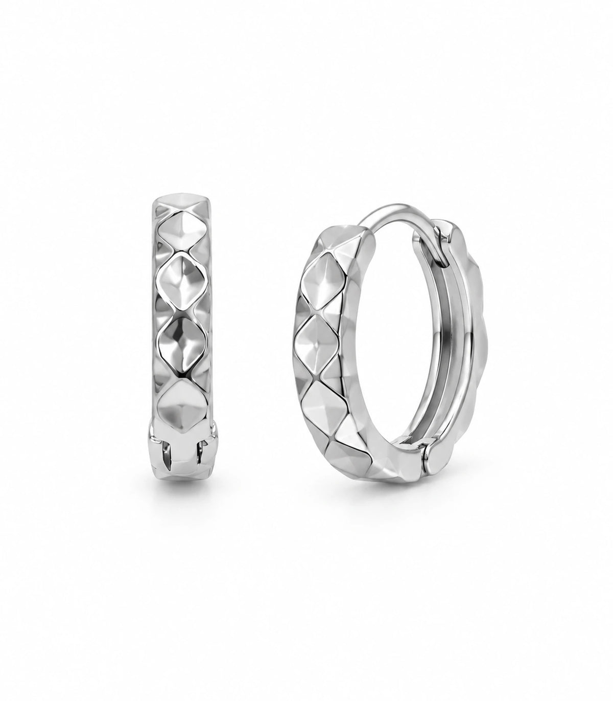 JIMIKI silver faceted diamond pattern huggie earrings, matching pair on white background #color_silver