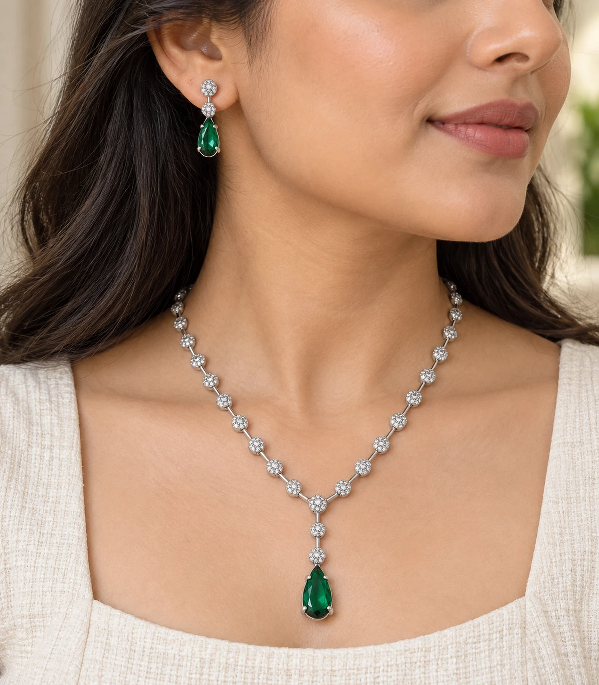 Close view of the Silver Green Teardrop Necklace Set worn naturally