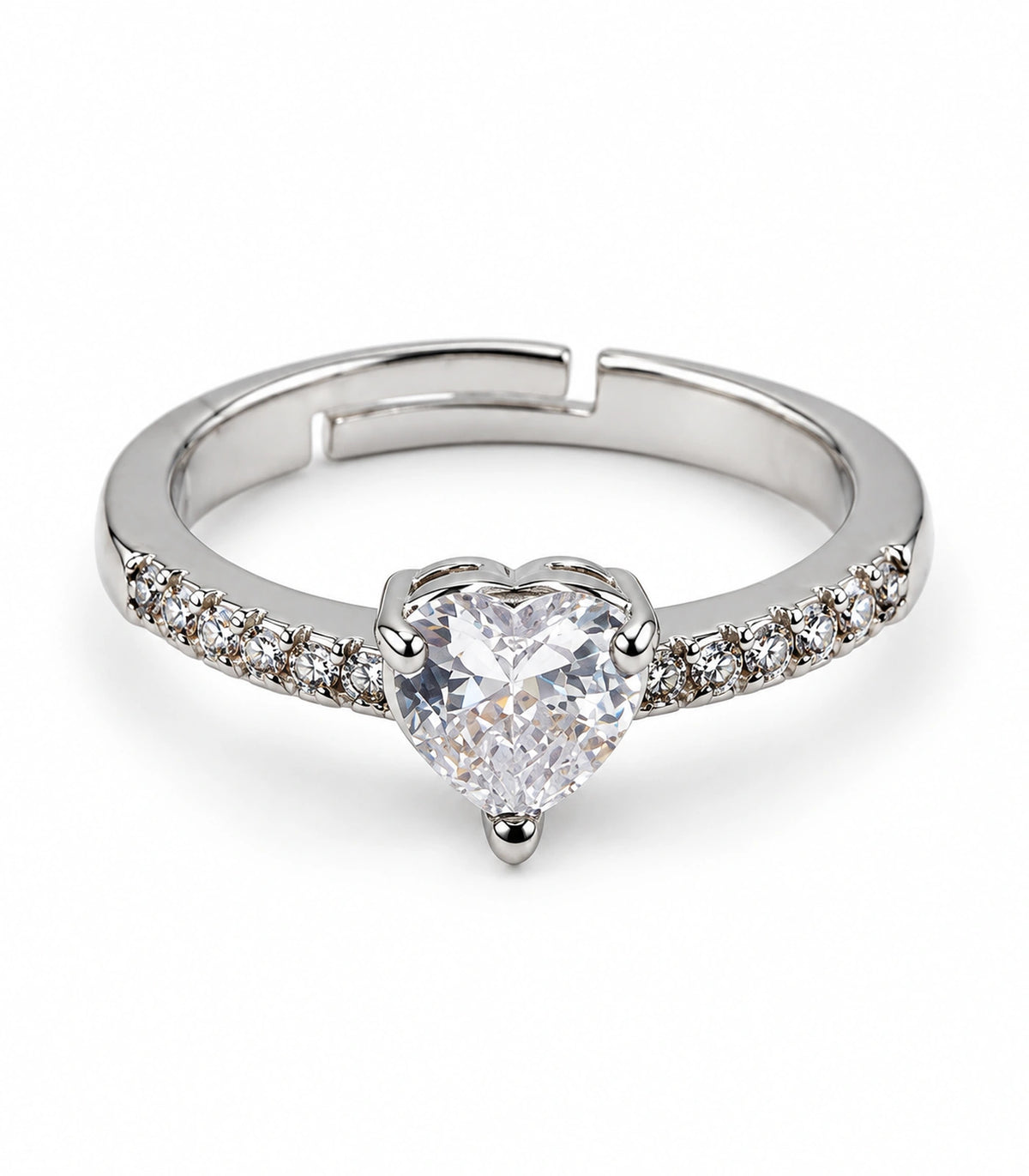 Silver-tone heart crystal pavé ring with adjustable band on a white background