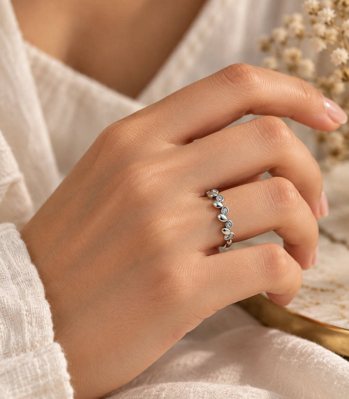 JIMIKI Silver Linked Leaf Crystal Ring in Silver - editorial worn view #color_silver