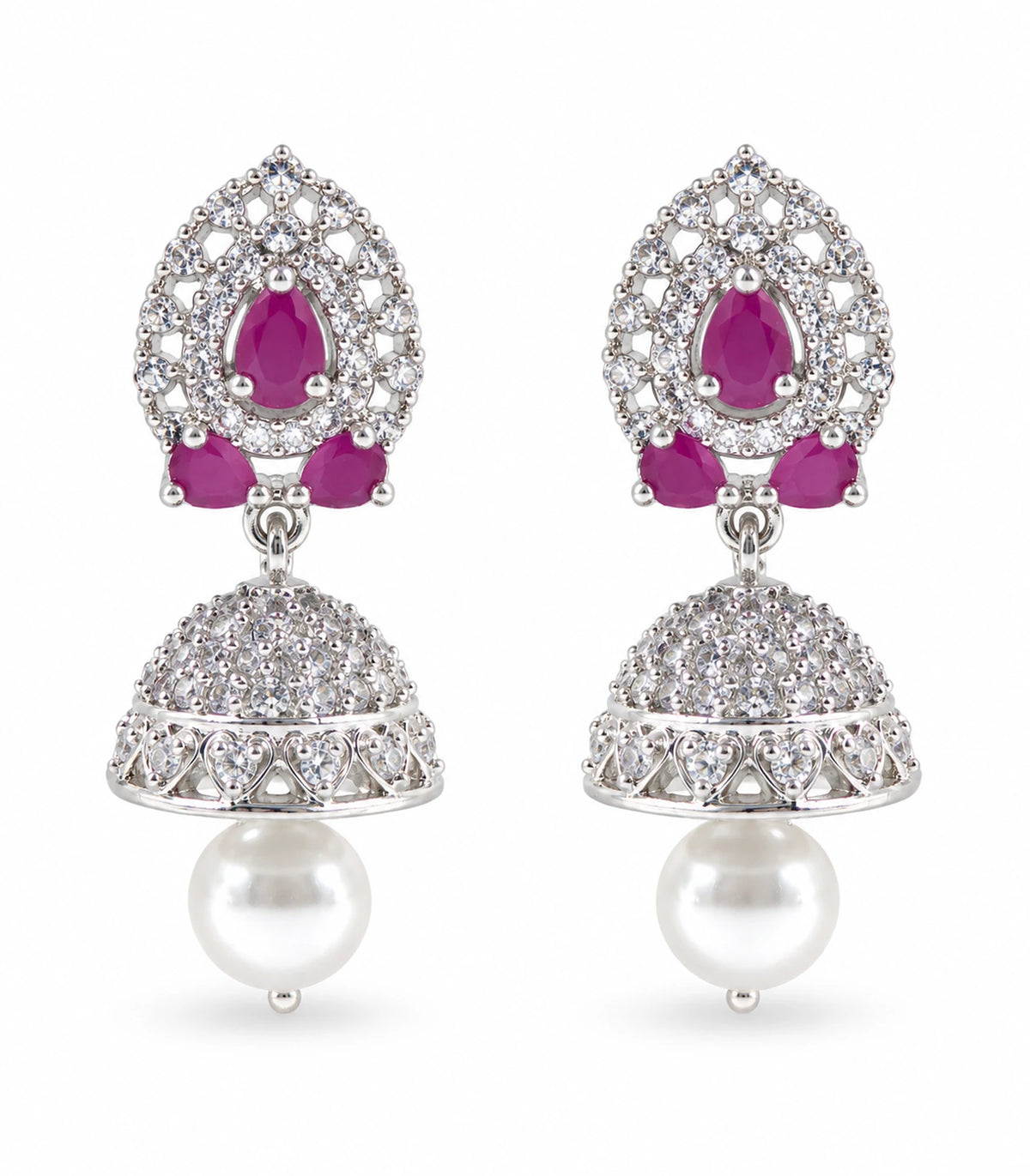 Matching pair of silver-tone magenta lattice teardrop jhumka earrings with white pearl-style drops on white