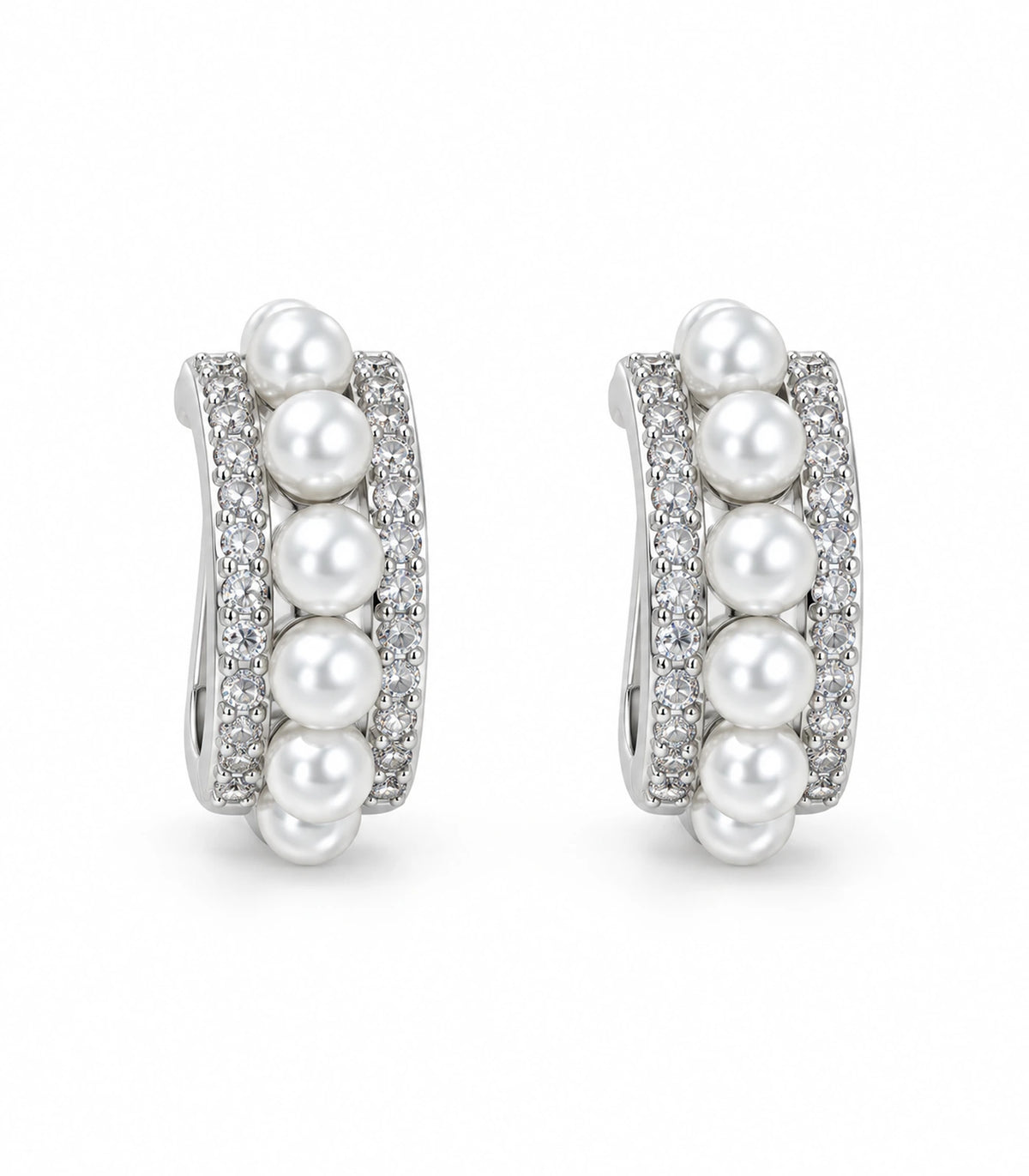 Pair of silver-tone pearl and pavé triple-row huggie earrings on a white background