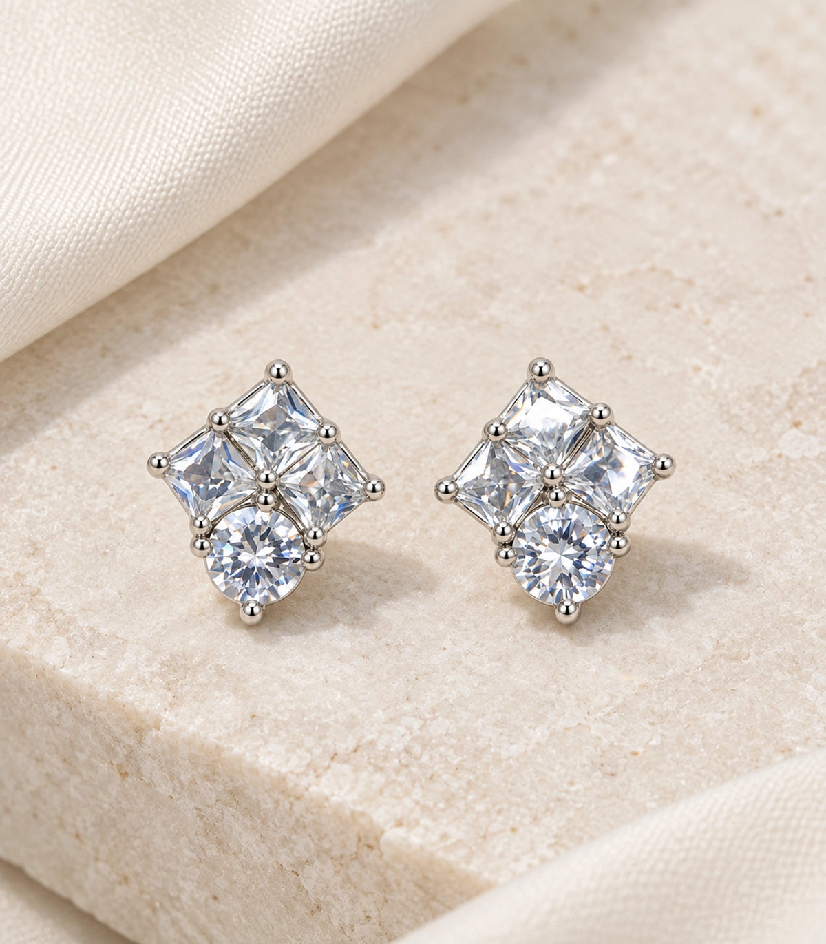 JIMIKI Silver Princess Round Cluster Stud Earrings — editorial flat lay #color_silver
