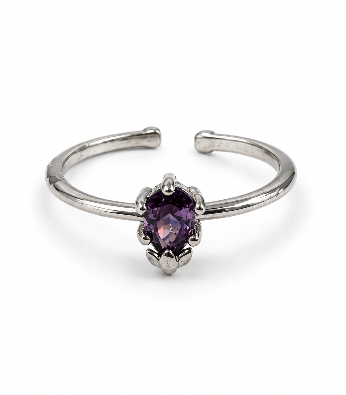 Silver-tone open-band ring with one purple oval solitaire on a white background