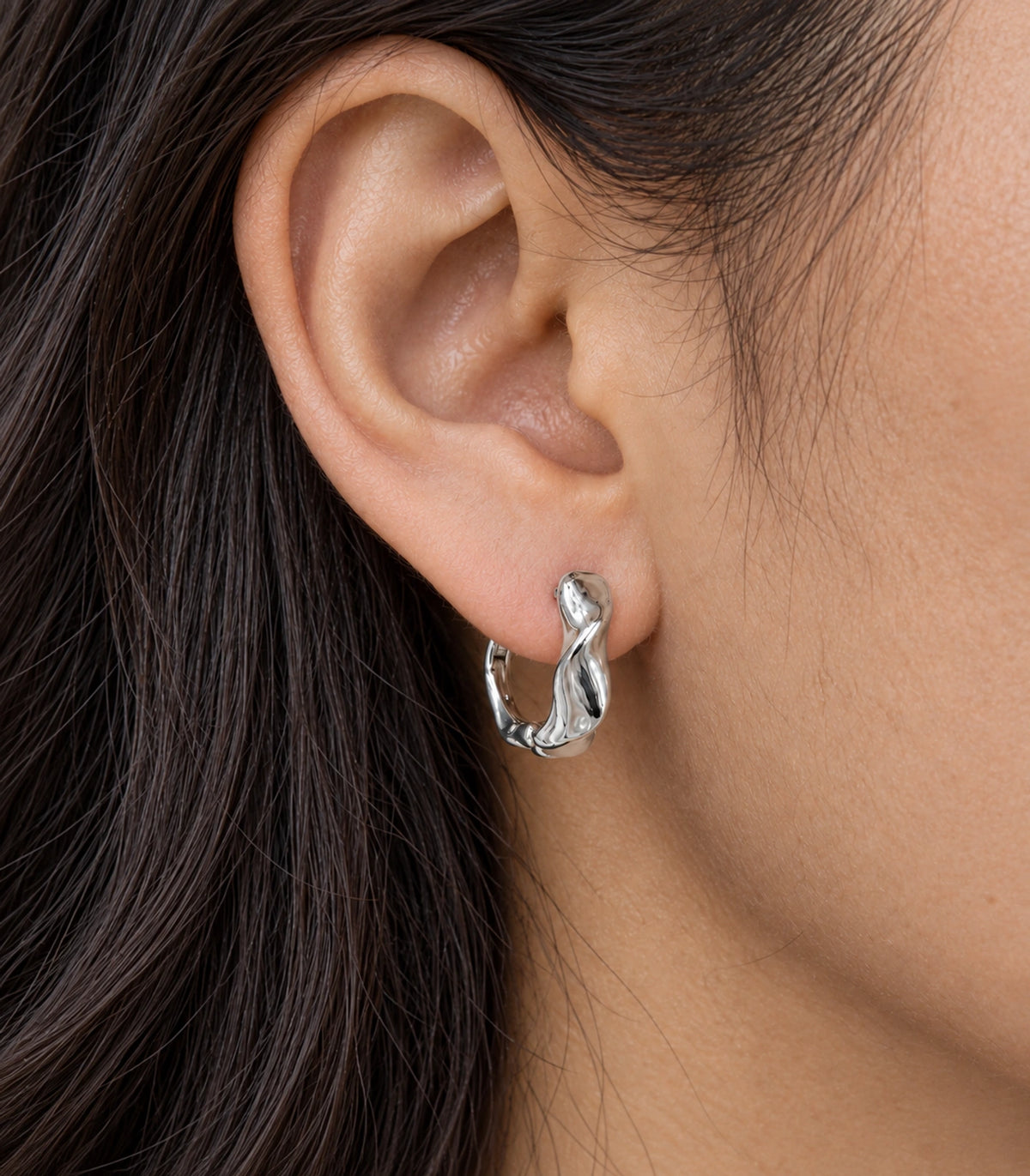 JIMIKI Silver Sculpted Twist Hoop Earrings - closeup #color_silver