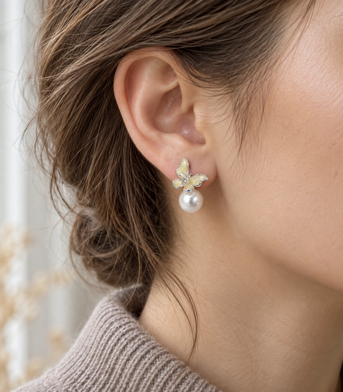 JIMIKI Asymmetric Butterfly Pearl-Style Earrings in Cream / silver-tone / white, model wearing view #color_cream / silver-tone / white