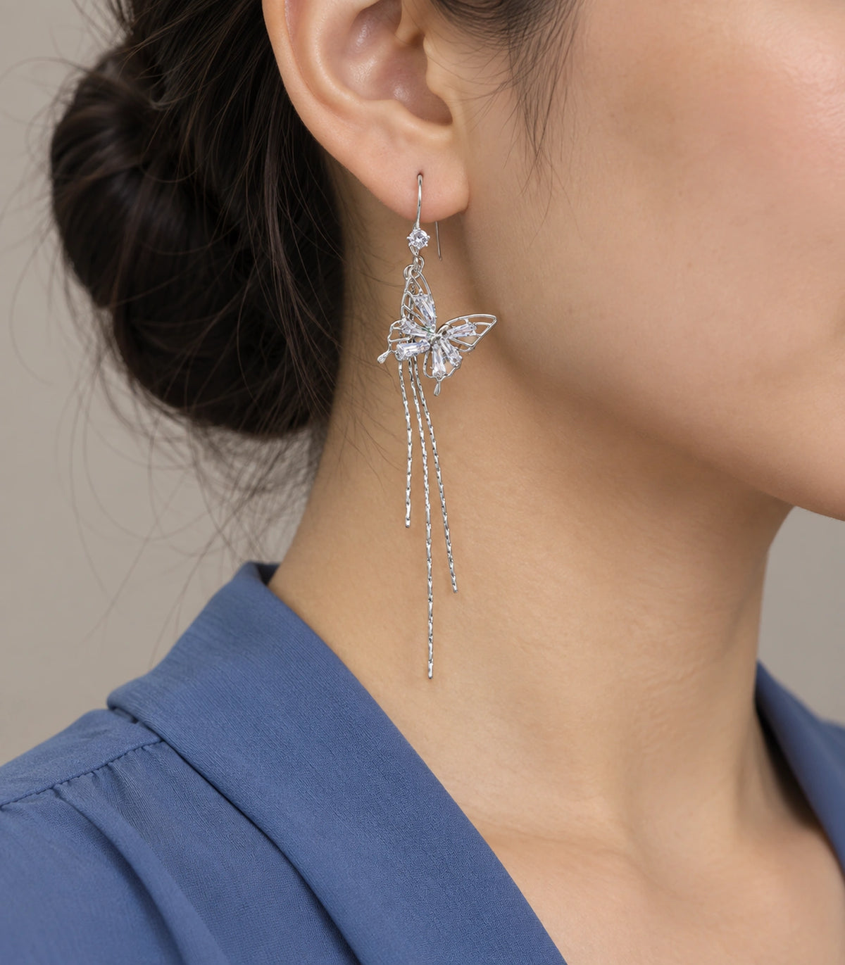 JIMIKI Silver Tone Baguette Butterfly Three Chain Earring Pair in Silver-tone, model wearing view