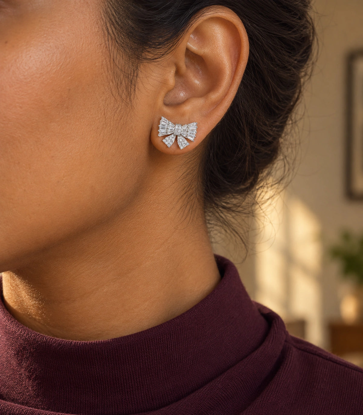 JIMIKI Baguette Crystal Bow Stud Earring Pair in Silver-tone, editorial model view #color_silver-tone
