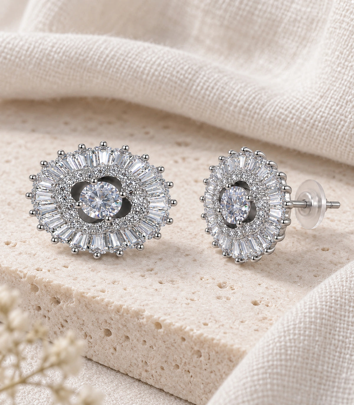 JIMIKI Baguette Halo Round Crystal Stud Earring Pair in Silver Tone, editorial flat lay #color_silver tone