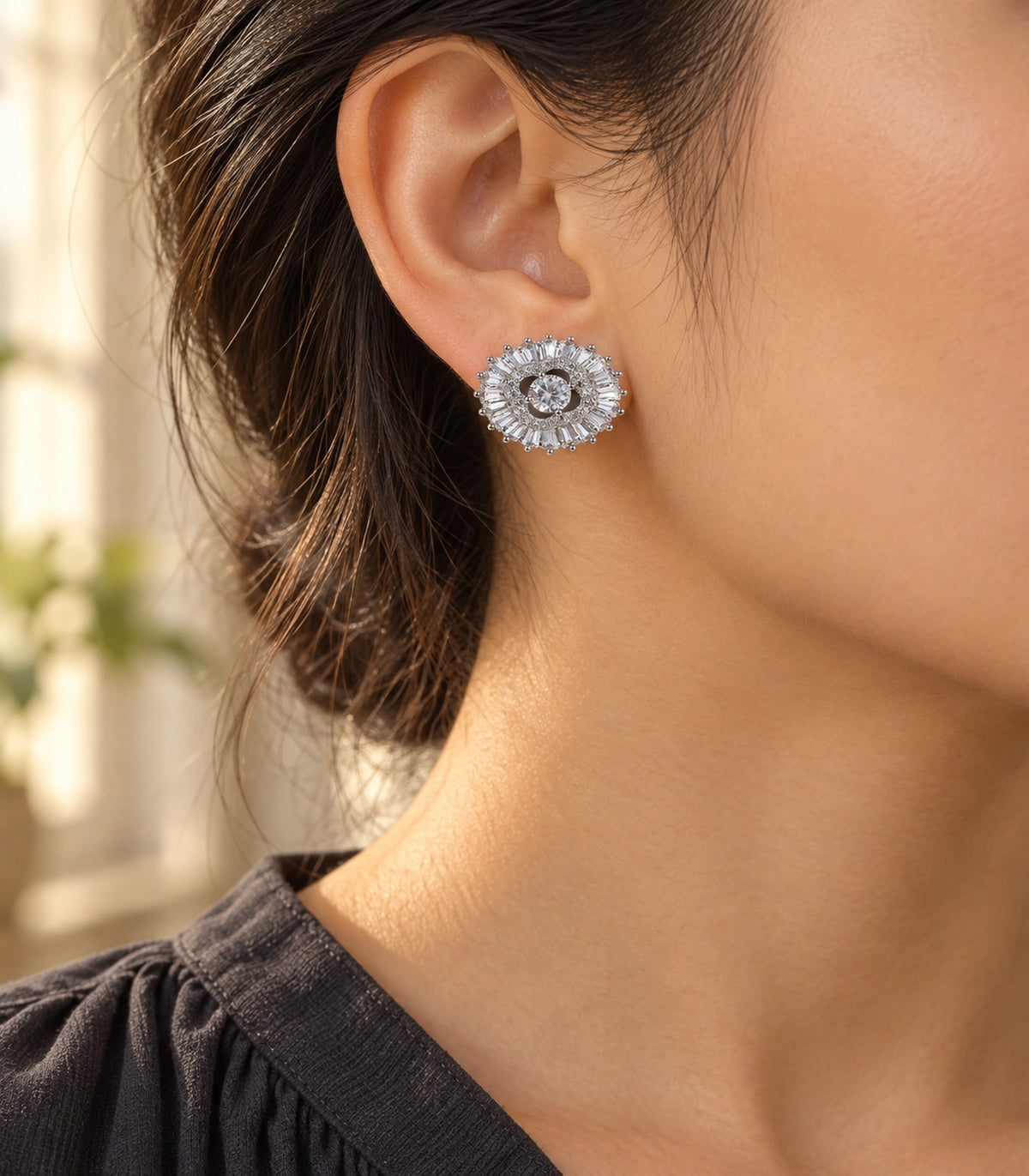 JIMIKI Baguette Halo Round Crystal Stud Earring Pair in Silver Tone, editorial model view #color_silver tone