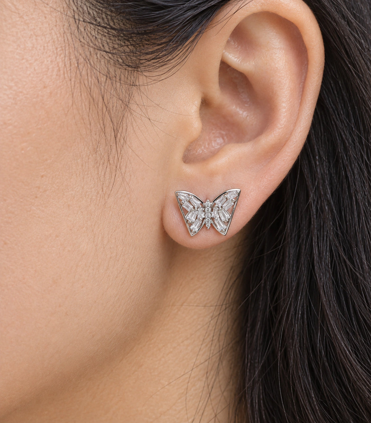 JIMIKI Silver-Tone Baguette Wing Butterfly Stud Earrings in Silver-tone, close-up detail