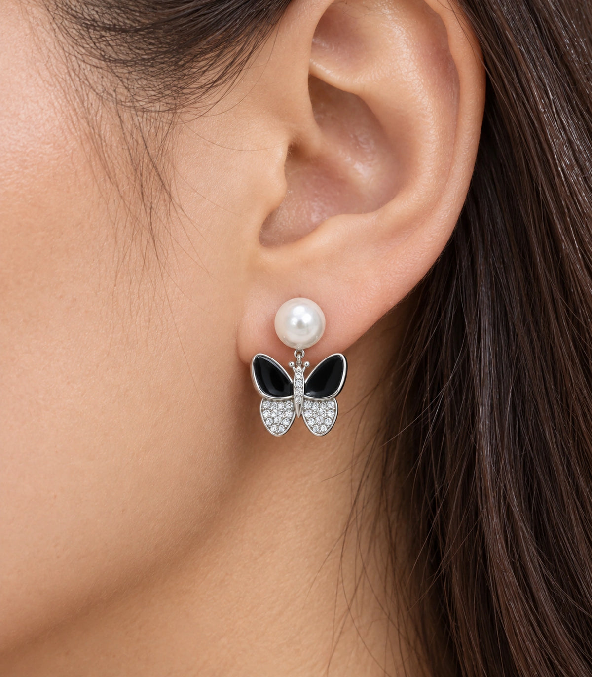 JIMIKI Silver Tone Black Enamel Butterfly Pearl Stud Earring Pair in Black / White Pearl / Silver, close-up detail