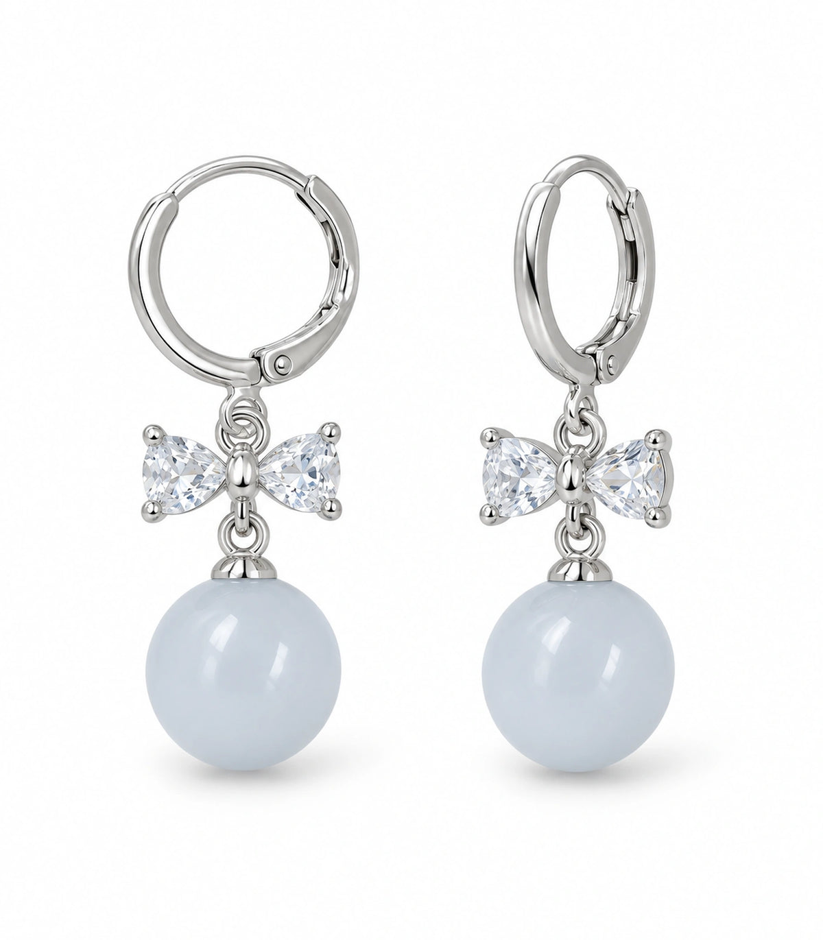 JIMIKI Silver-Tone Clear Crystal Bow Pale Blue Bead-Drop Huggie Earrings in Silver / Clear / Pale Blue, white background product view