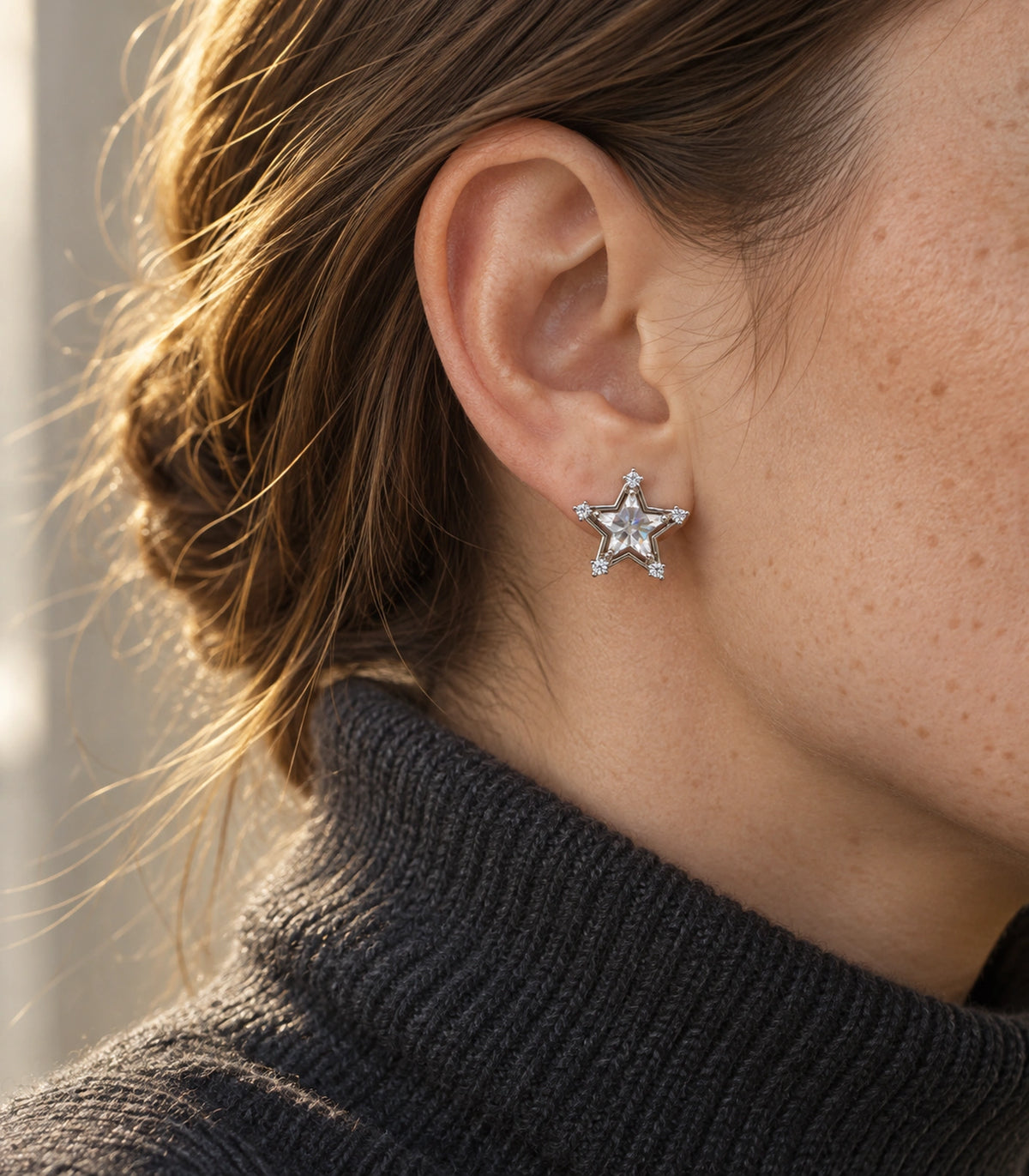 JIMIKI Crystal Star Stud Earring Pair in Silver tone, editorial model view #color_silver tone