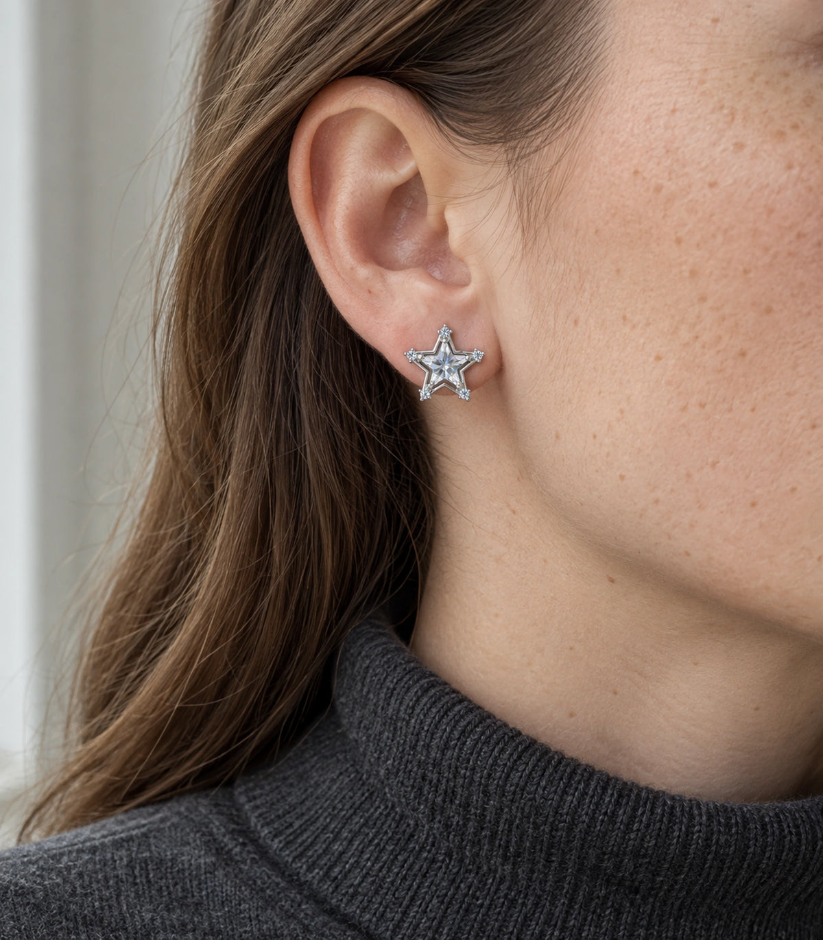 JIMIKI Crystal Star Stud Earring Pair in Silver tone, model wearing view #color_silver tone