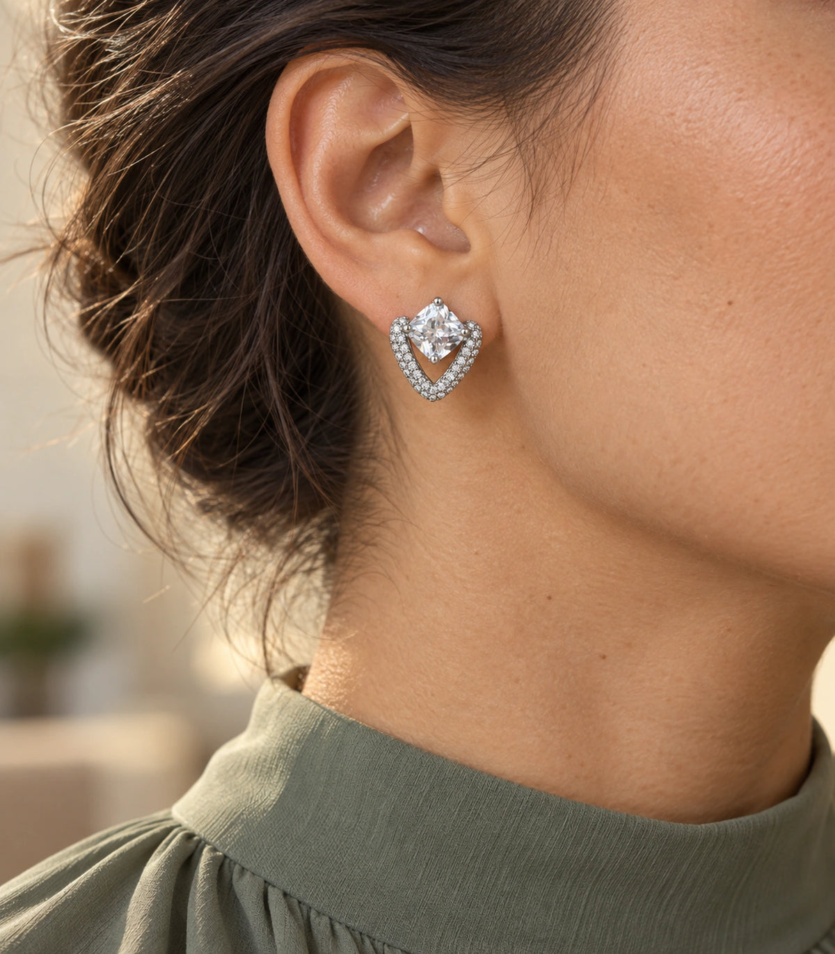 JIMIKI Silver Tone Clear Cushion Crystal Open Heart Stud Earring Pair in Silver-tone, editorial model view