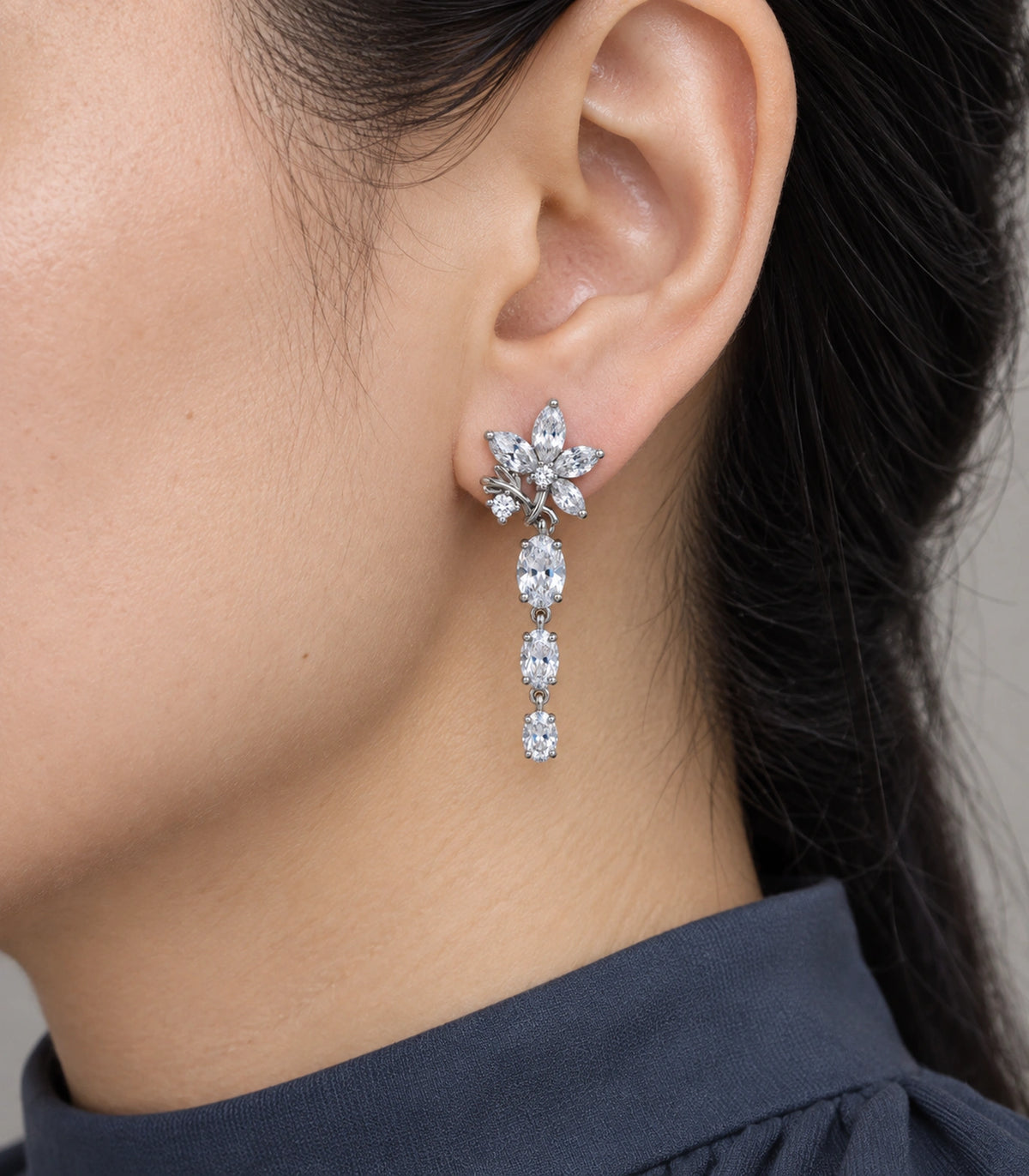 JIMIKI Floral Triple Oval Drop Earring Pair in Silver tone / clear, close-up detail #color_silver tone / clear