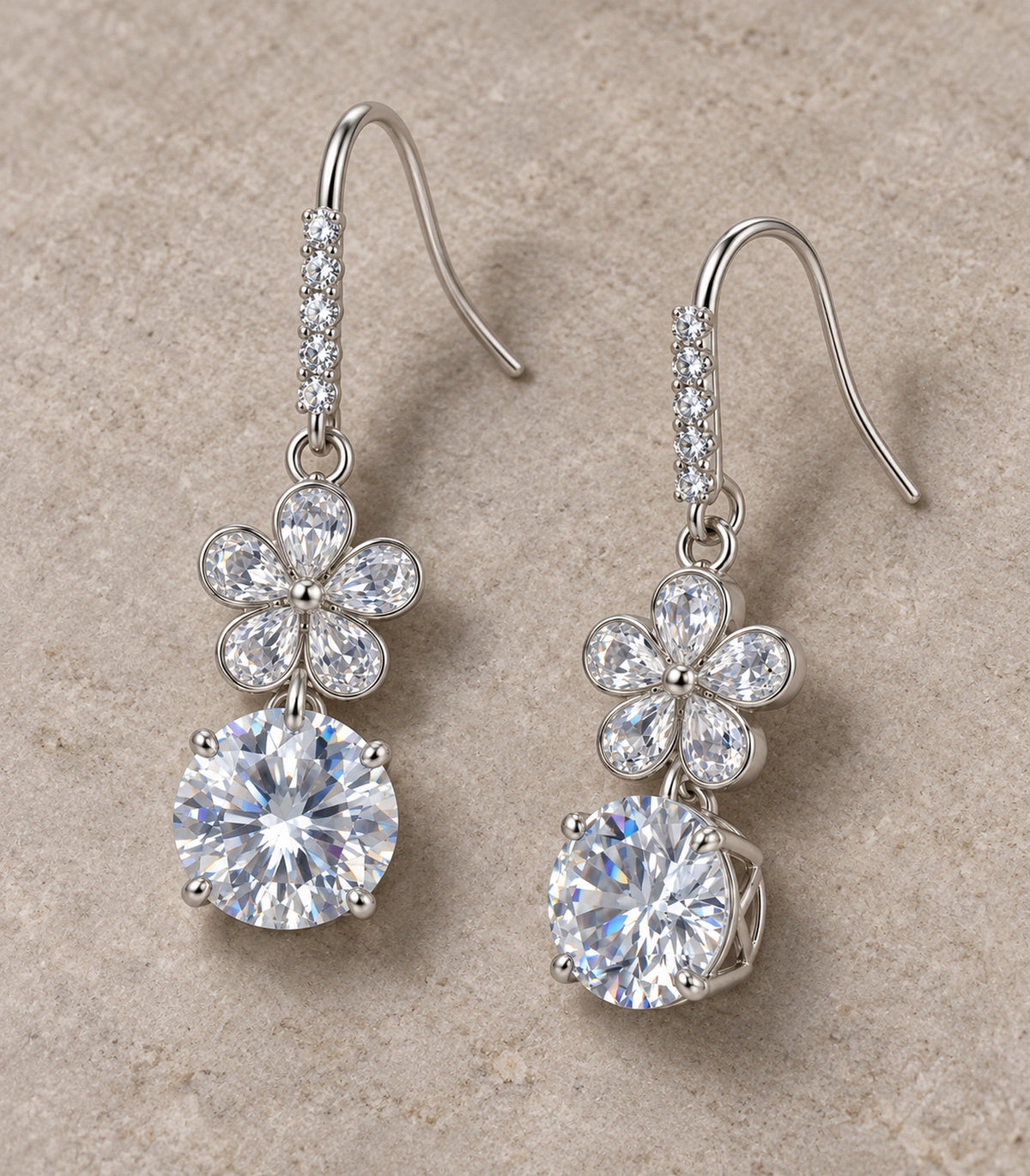 JIMIKI Silver Tone Clear Flower Round Solitaire Drop Earring Pair in Silver tone / clear, editorial flat lay