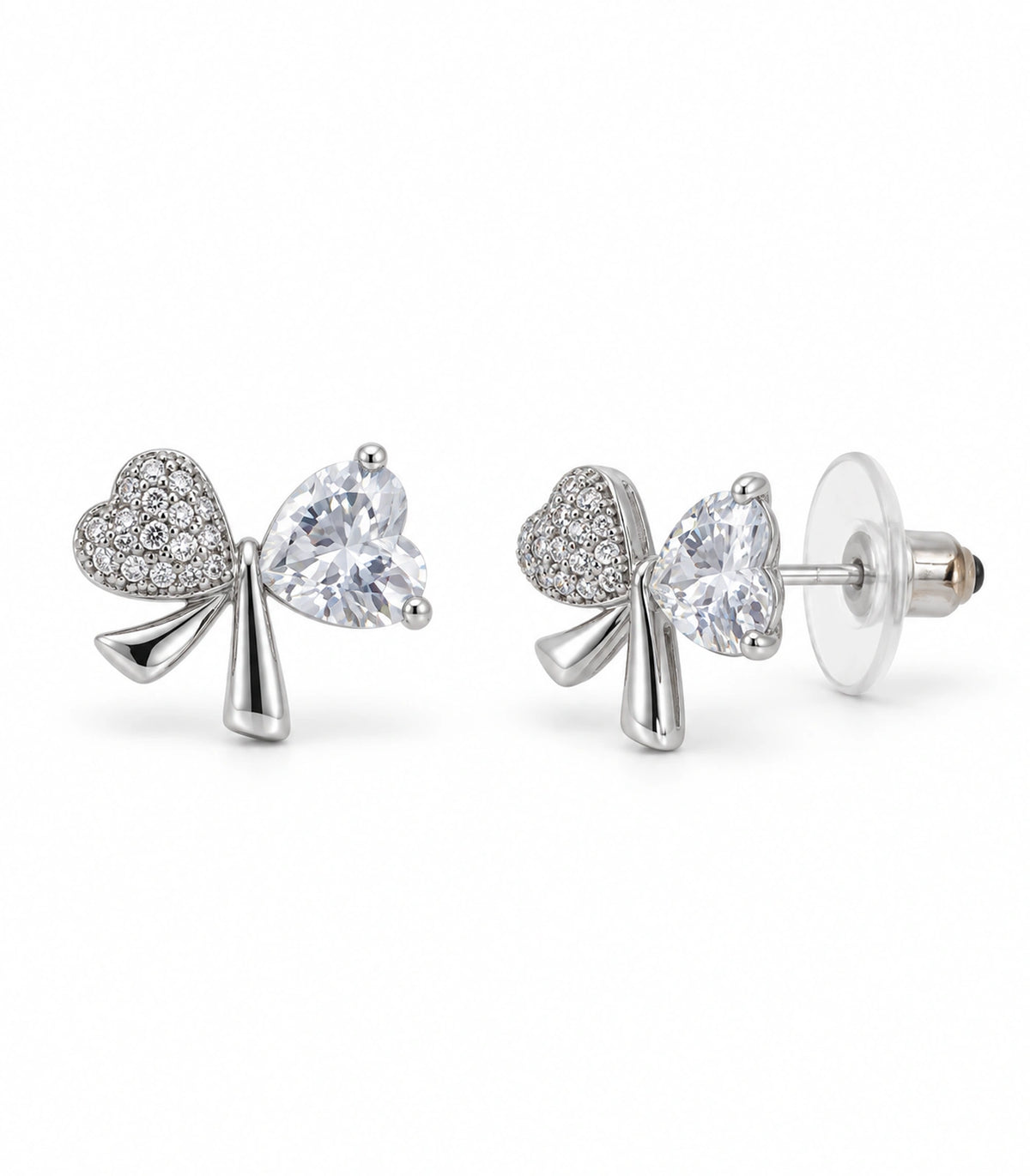 JIMIKI Silver Tone Clear Heart Bow Stud Earring Pair in Silver tone, white background product view