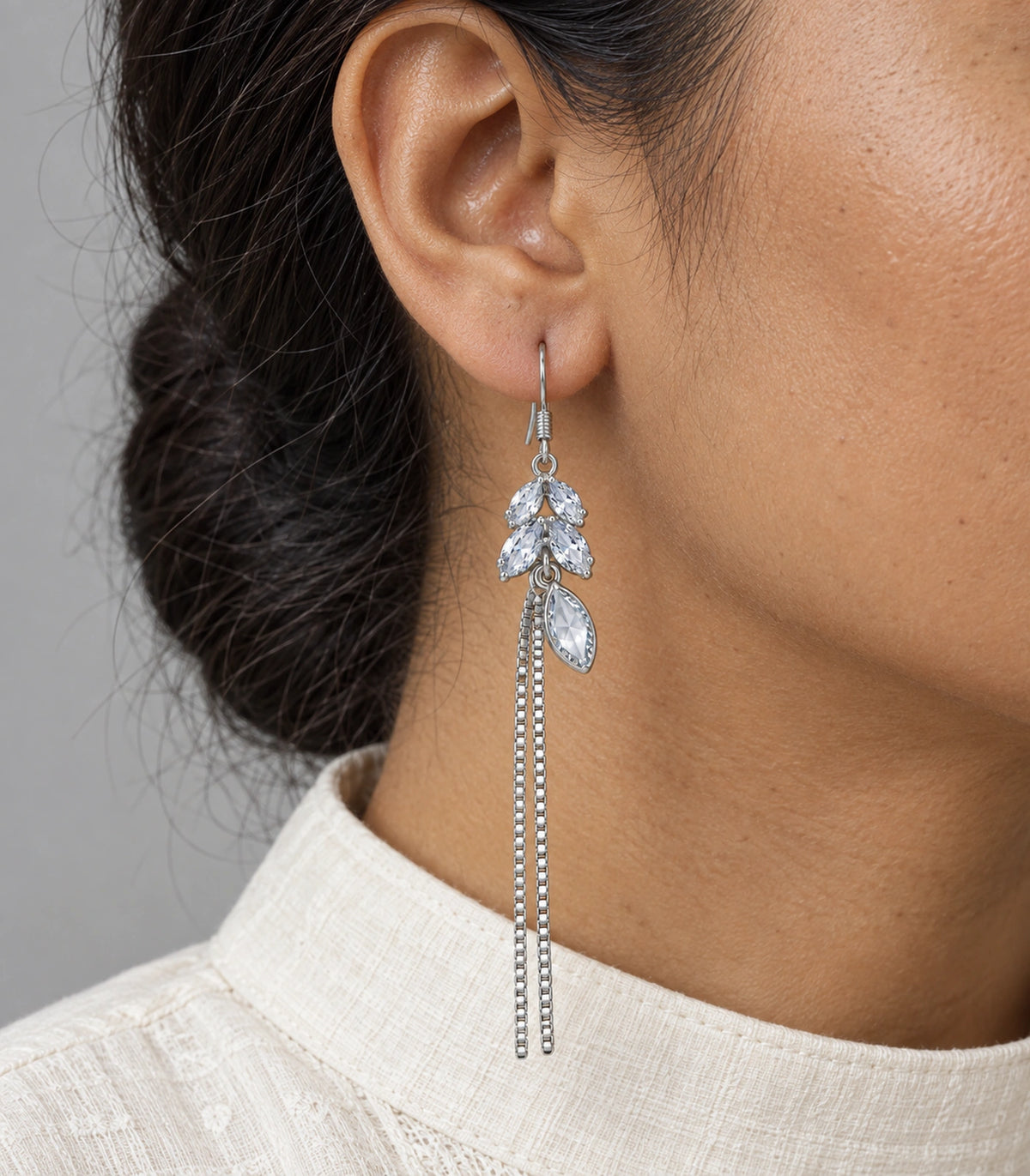 JIMIKI Silver Tone Clear Leaf Cluster Chain Tassel Earring Pair in Silver tone / clear, close-up detail