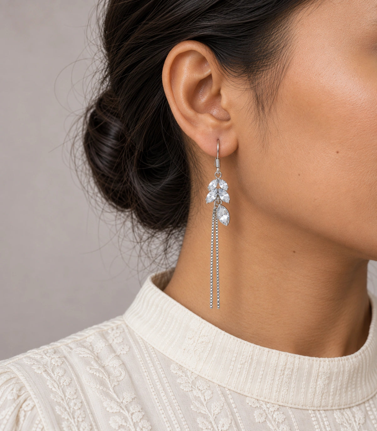 JIMIKI Silver Tone Clear Leaf Cluster Chain Tassel Earring Pair in Silver tone / clear, model wearing view