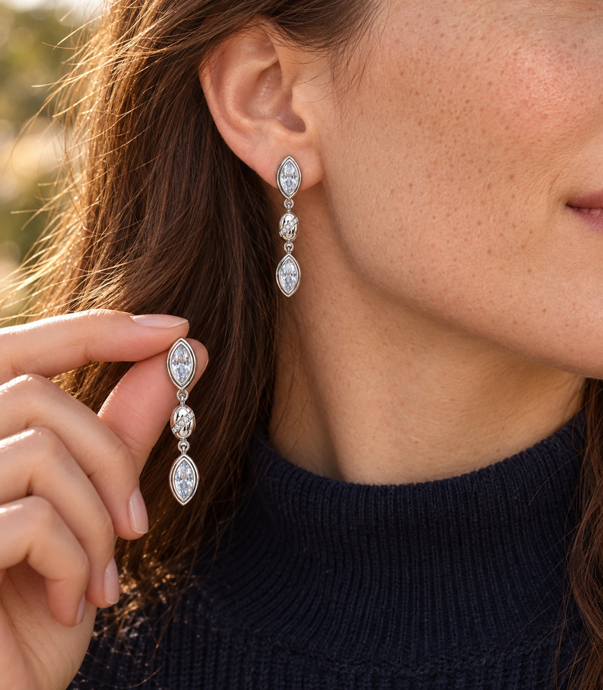 JIMIKI Marquise Crystal Oval Link Drop Earring Pair in Silver-tone, editorial model view #color_silver-tone