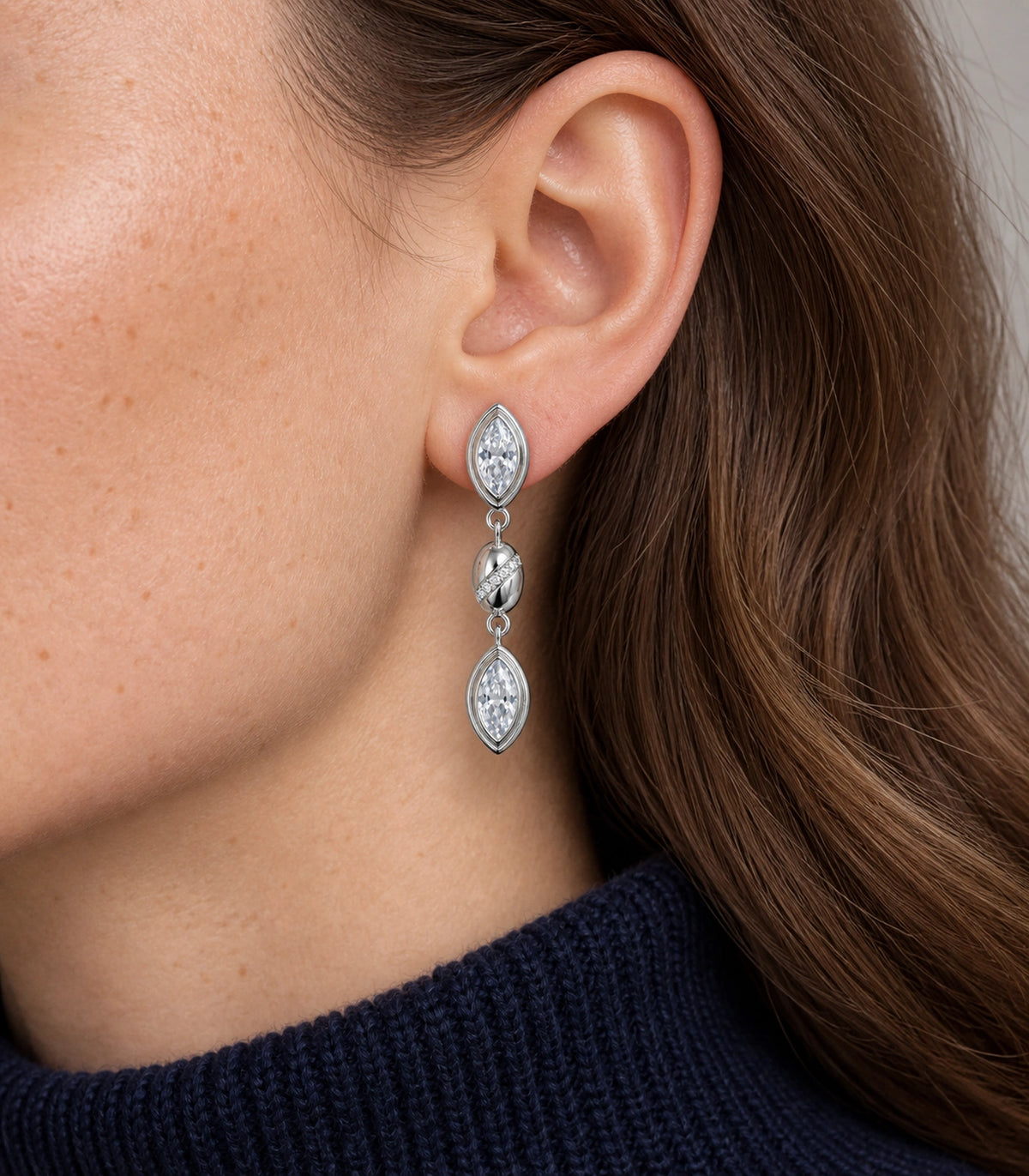 JIMIKI Marquise Crystal Oval Link Drop Earring Pair in Silver-tone, model wearing view #color_silver-tone