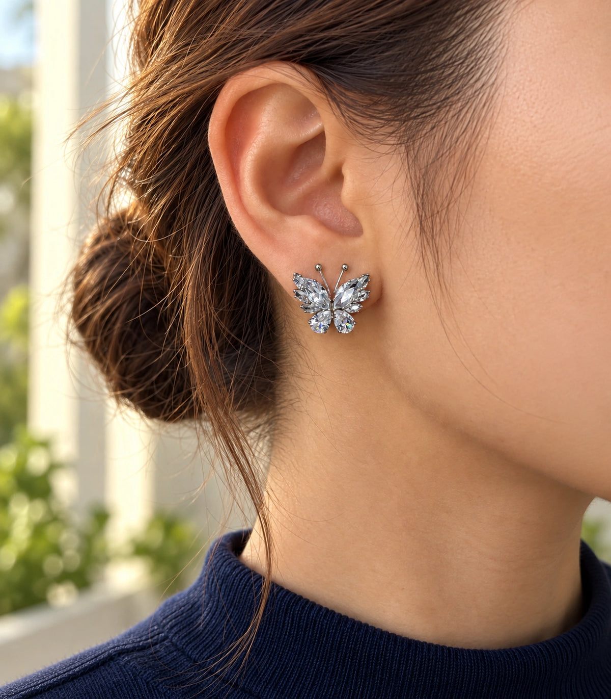 JIMIKI Marquise Teardrop Butterfly Stud Earring Pair in Silver tone/Clear, editorial model view #color_silver tone/clear