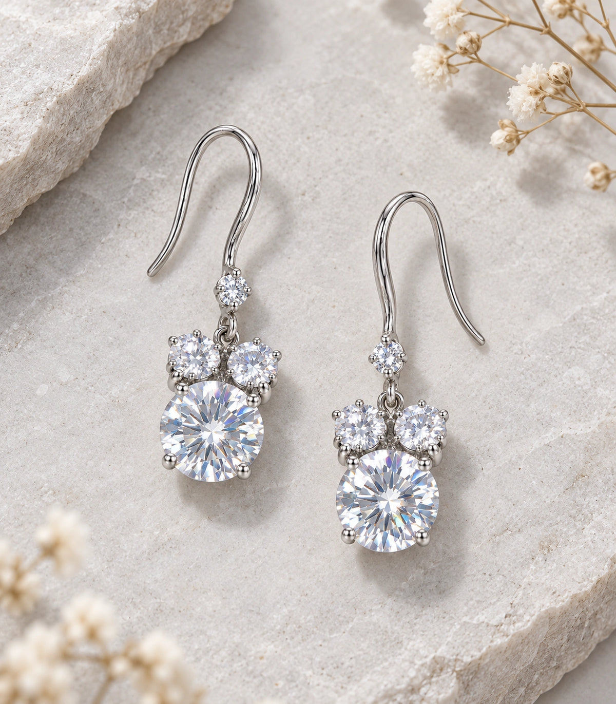 JIMIKI Silver Tone Clear Round Cluster Drop Earring Pair in Clear, editorial flat lay