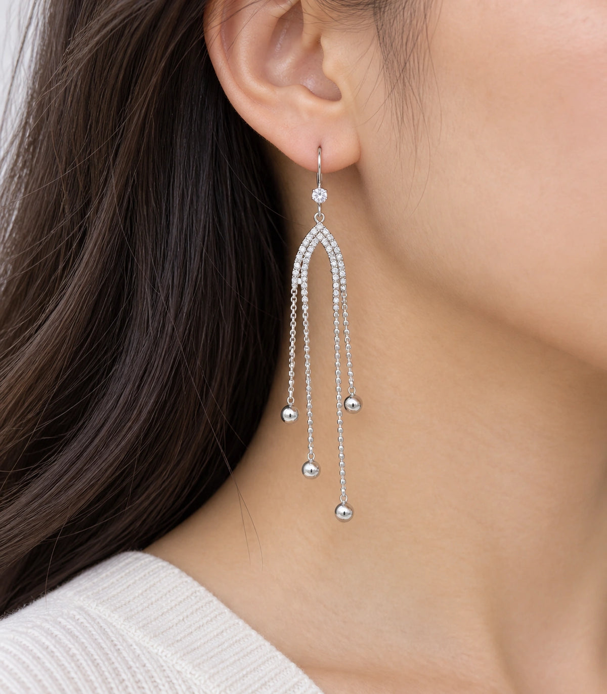 JIMIKI Silver Tone Crystal Arch Four Ball Chain Earring Pair in Silver-tone, model wearing view