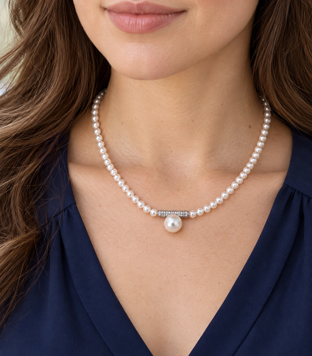 JIMIKI Silver Tone Crystal Bar Pearl Drop Necklace in Silver / White, model wearing view