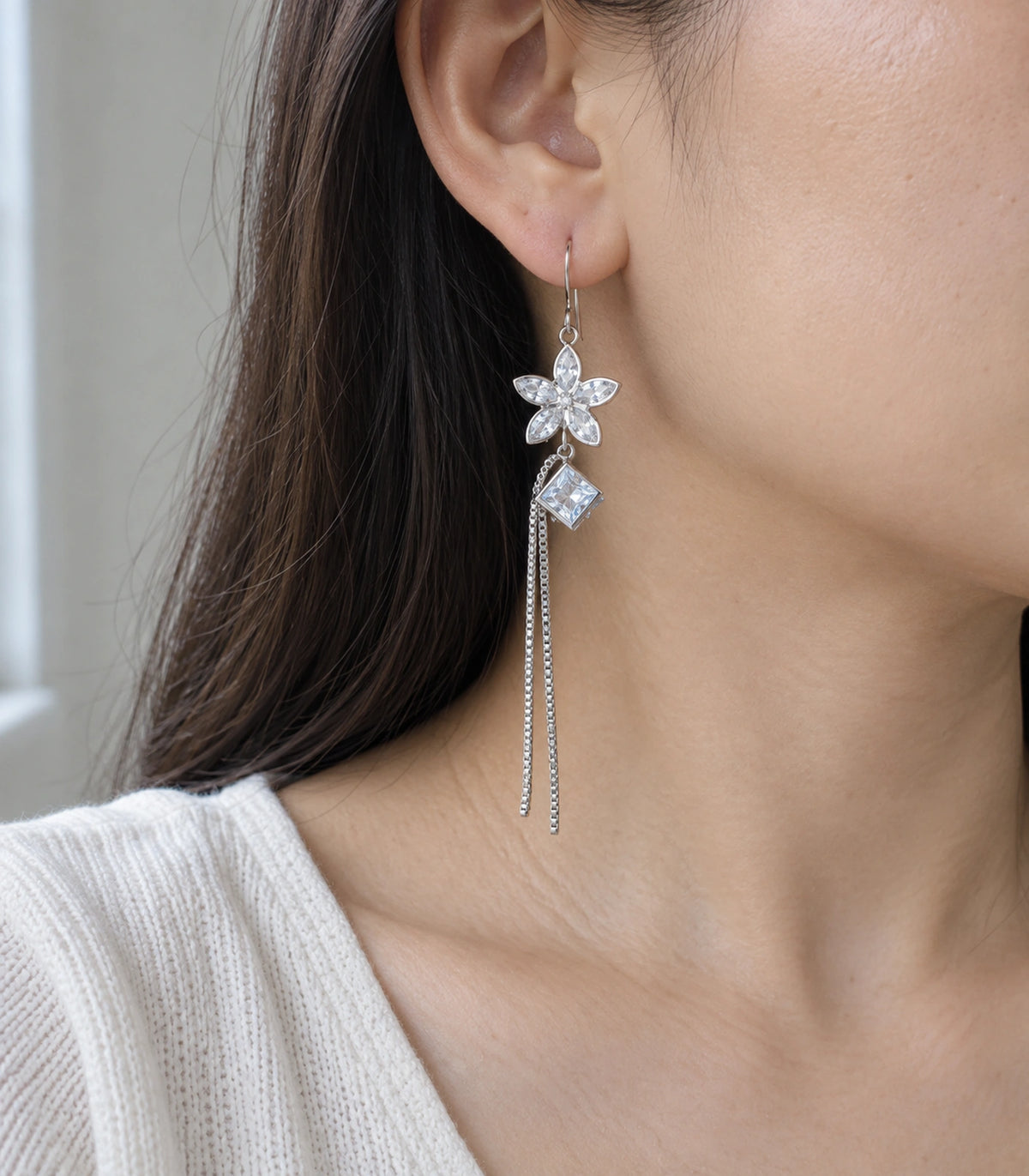 JIMIKI Silver Tone Crystal Flower Square Chain Tassel Earring Pair in Silver tone, model wearing view