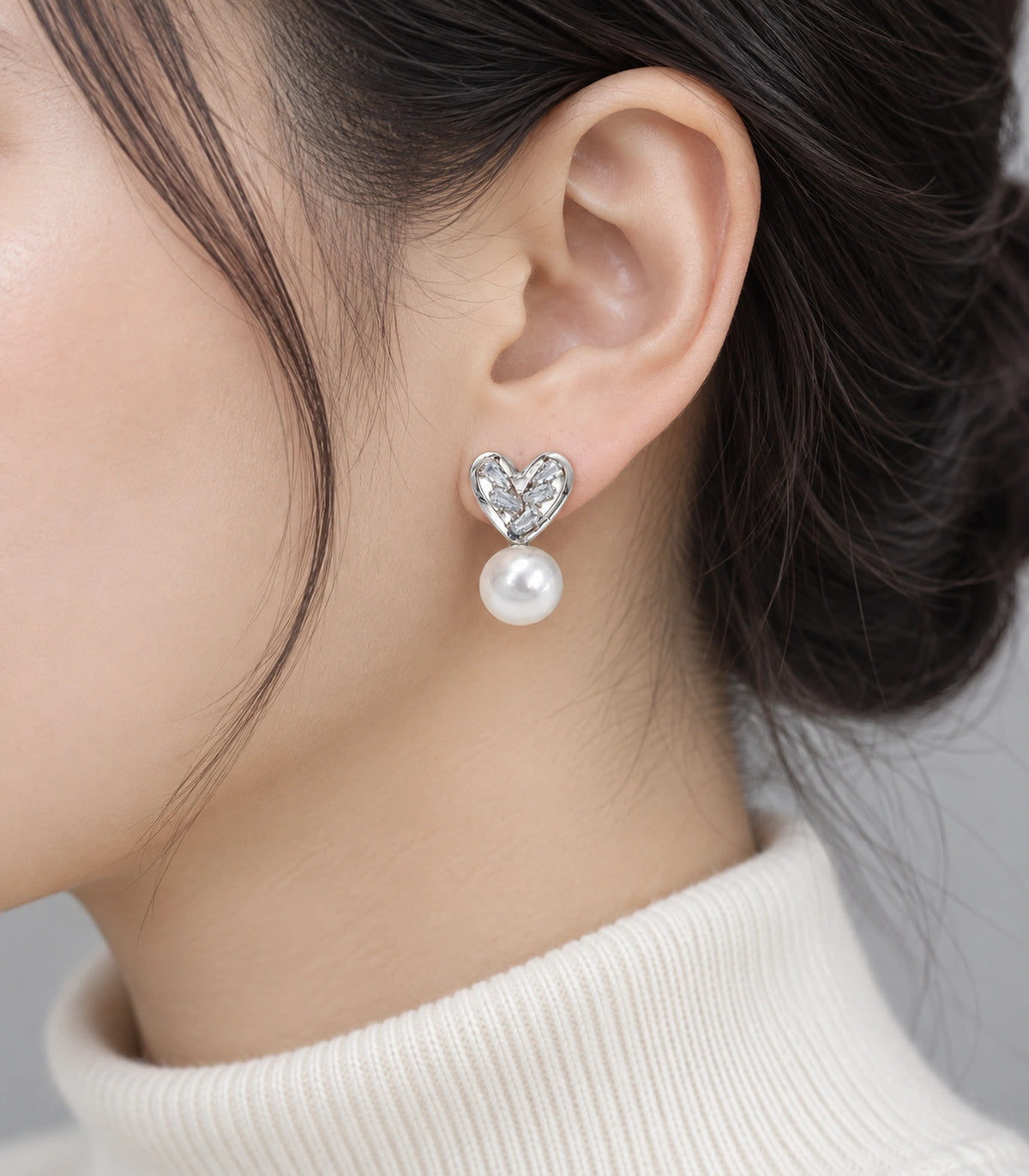 JIMIKI Silver-Tone Crystal Heart Pearl Drop Stud Earrings in Silver Tone, model wearing view