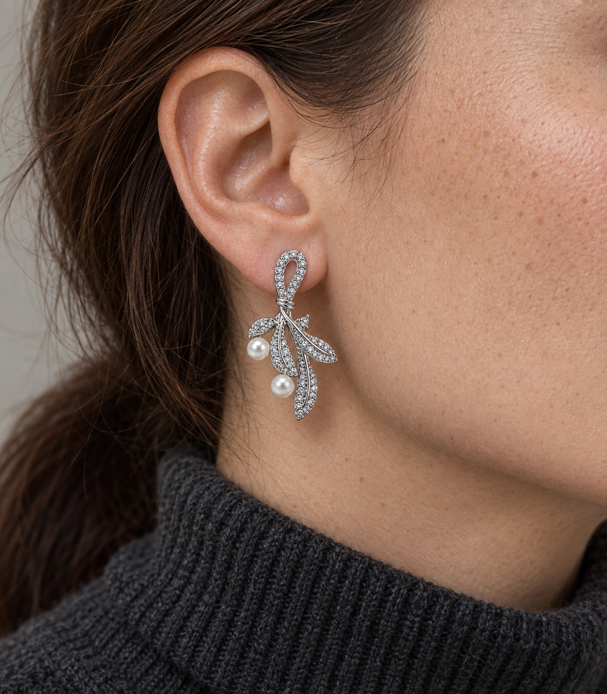 JIMIKI Crystal Leaf Two Pearl Drop Earring Pair in Silver-tone, close-up detail #color_silver-tone
