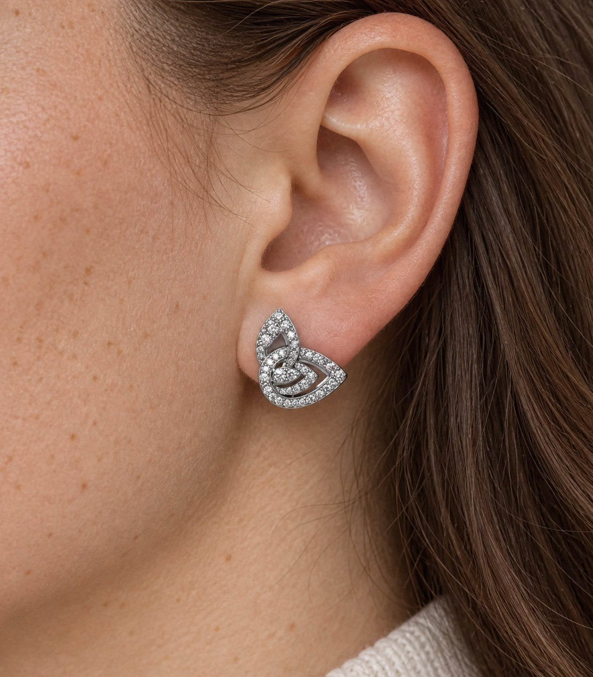 JIMIKI Crystal Open Swirl Stud Earring Pair in Silver tone, close-up detail #color_silver tone