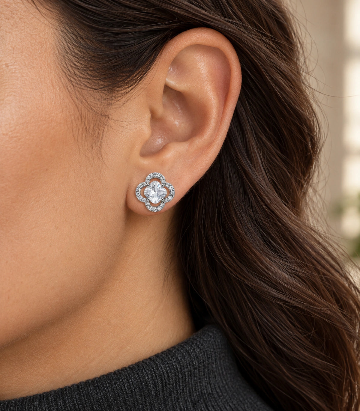 JIMIKI Crystal Quatrefoil Halo Stud Earring Pair in Silver Tone, editorial model view #color_silver tone
