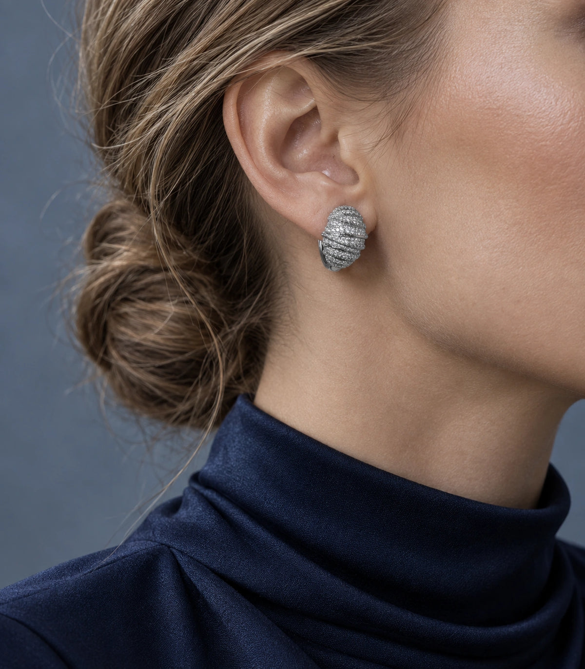 JIMIKI Crystal Ribbed Dome Huggie Earrings in Silver / Clear, editorial model view #color_silver / clear