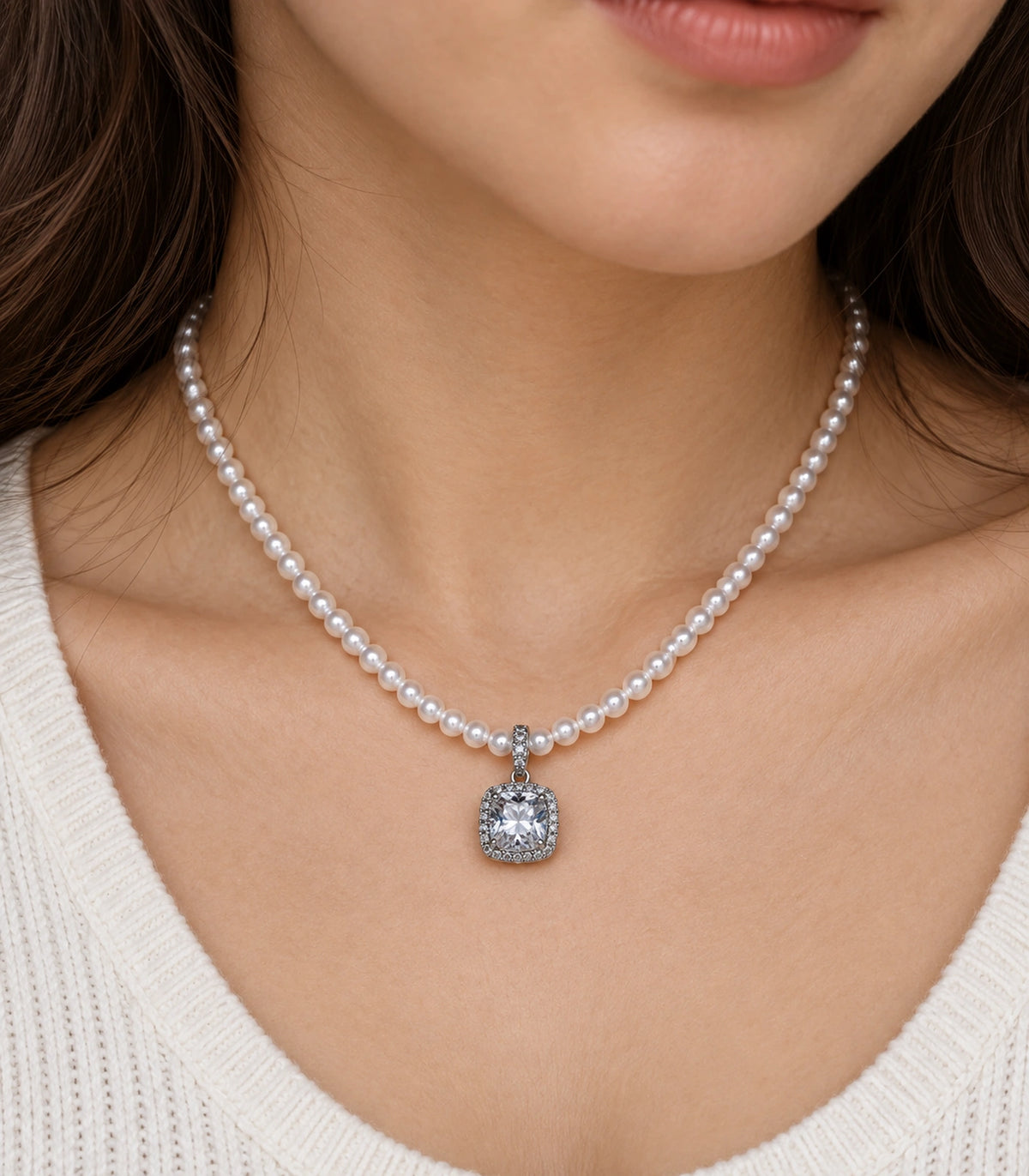 JIMIKI Silver-Tone Cushion Crystal Halo Pearl Necklace in Silver-tone / clear / white, close-up of the pendant and pearl-style strand