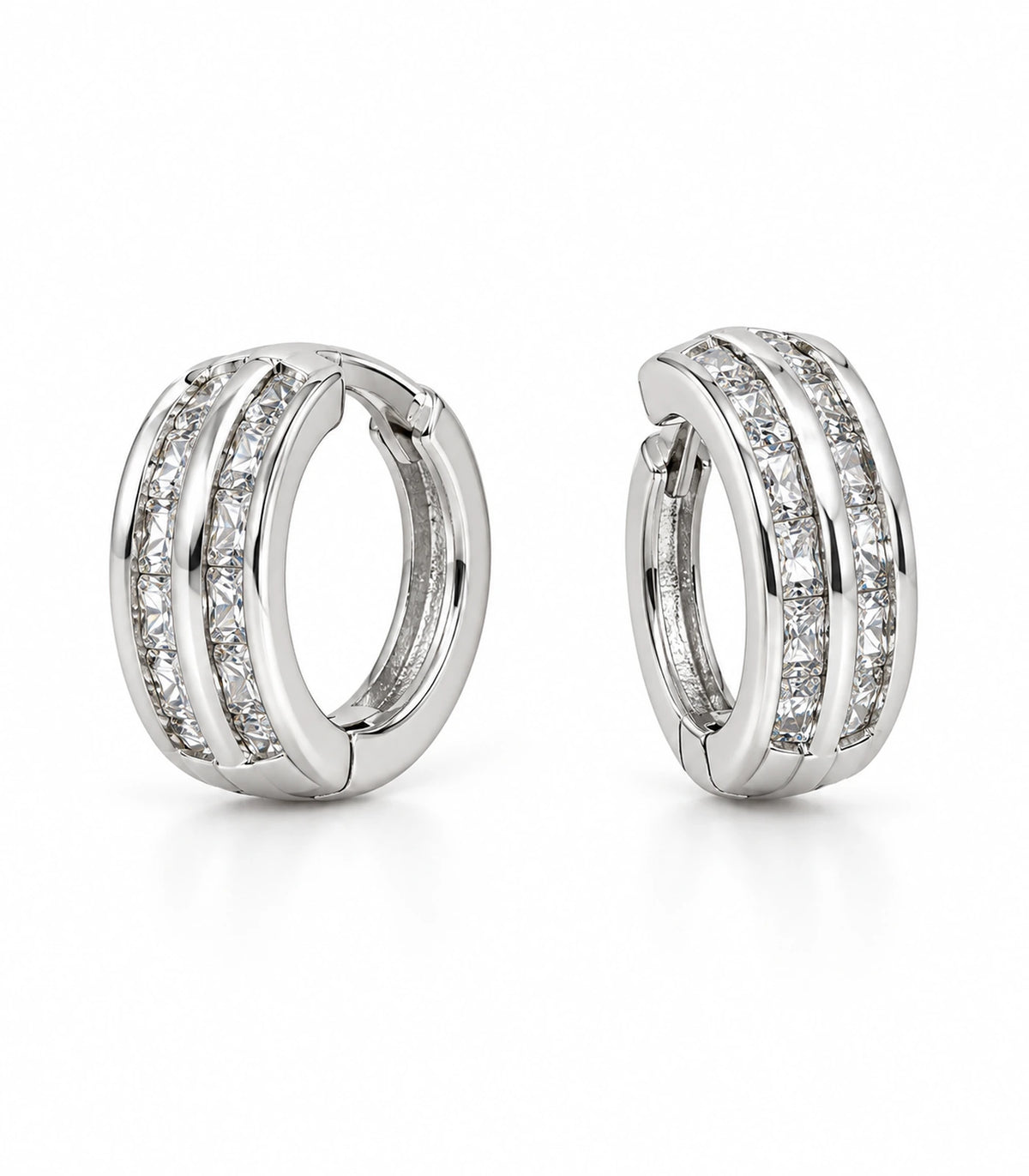 JIMIKI Silver Double Channel Crystal Huggie Hoop Earrings, matching pair on white background #color_silver