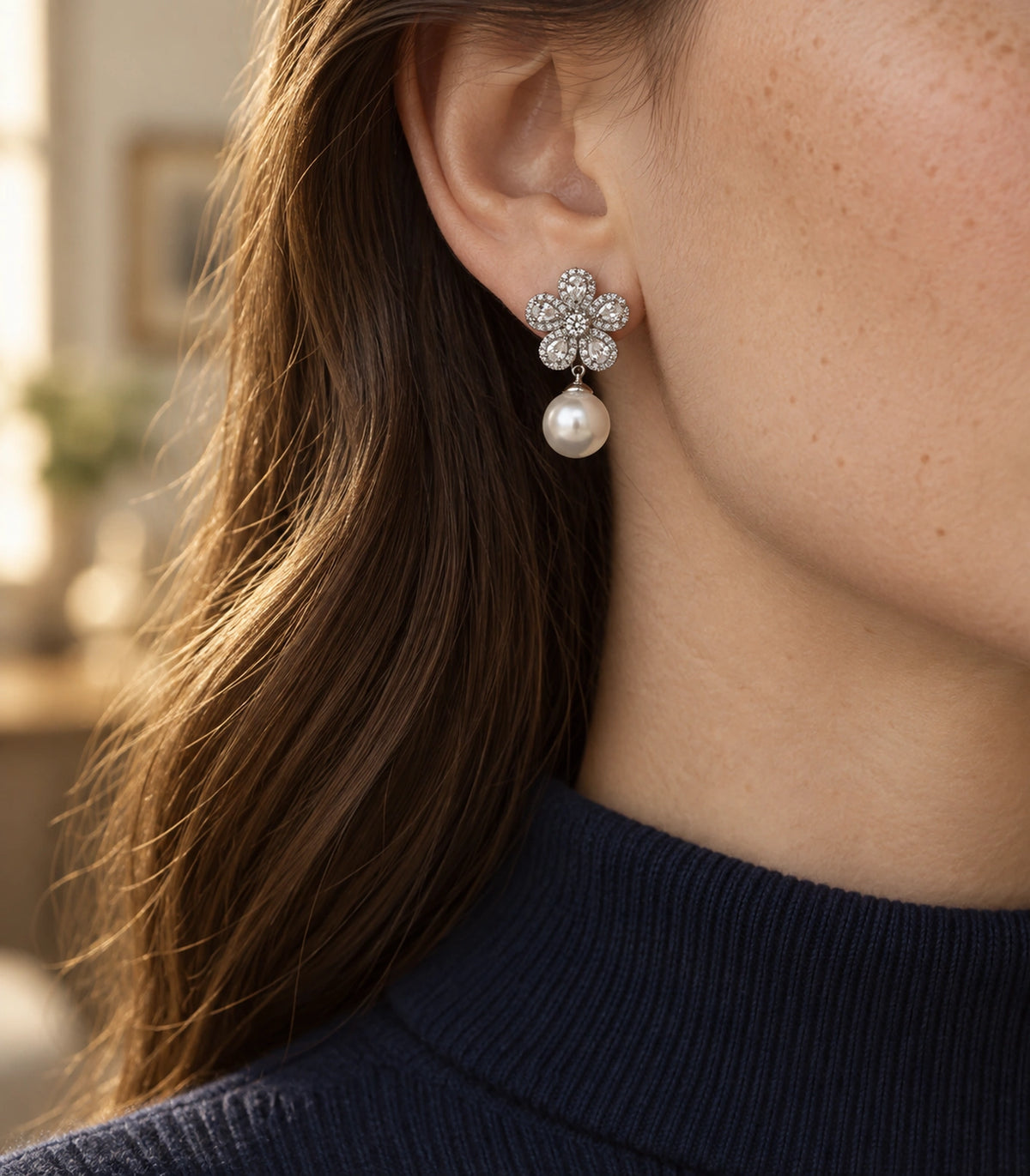 JIMIKI Five Petal Crystal Flower Pearl Drop Earring Pair in Silver-tone, editorial model view #color_silver-tone