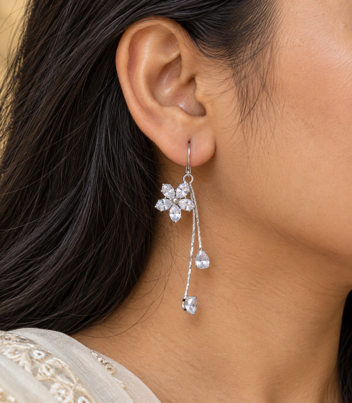 JIMIKI Silver-Tone Five-Petal Crystal Flower Twin Pear Drop Earrings in Silver Tone, close-up detail