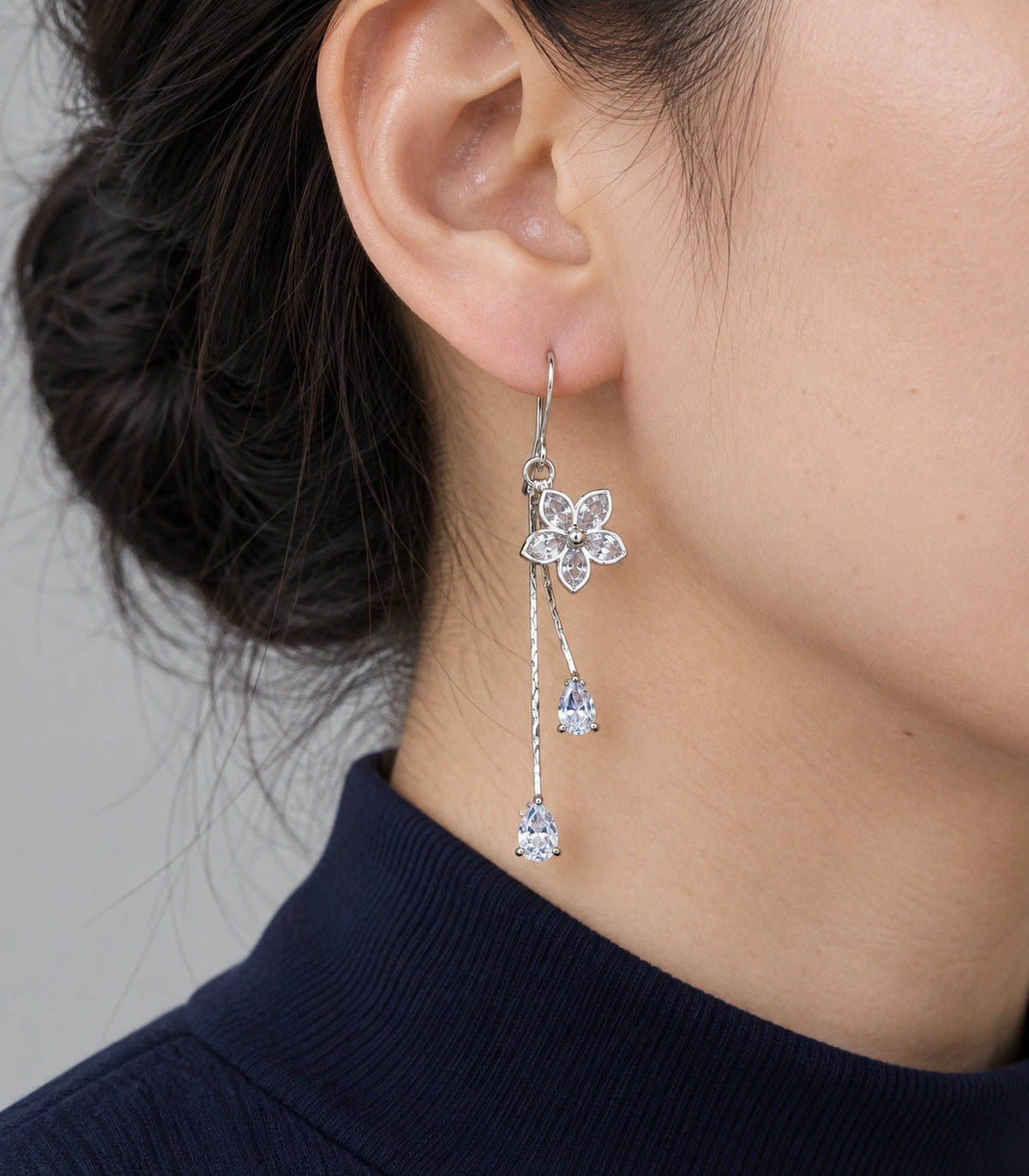 JIMIKI Silver Tone Five Petal Flower Twin Pear Drop Earring Pair in Silver-tone, close-up detail