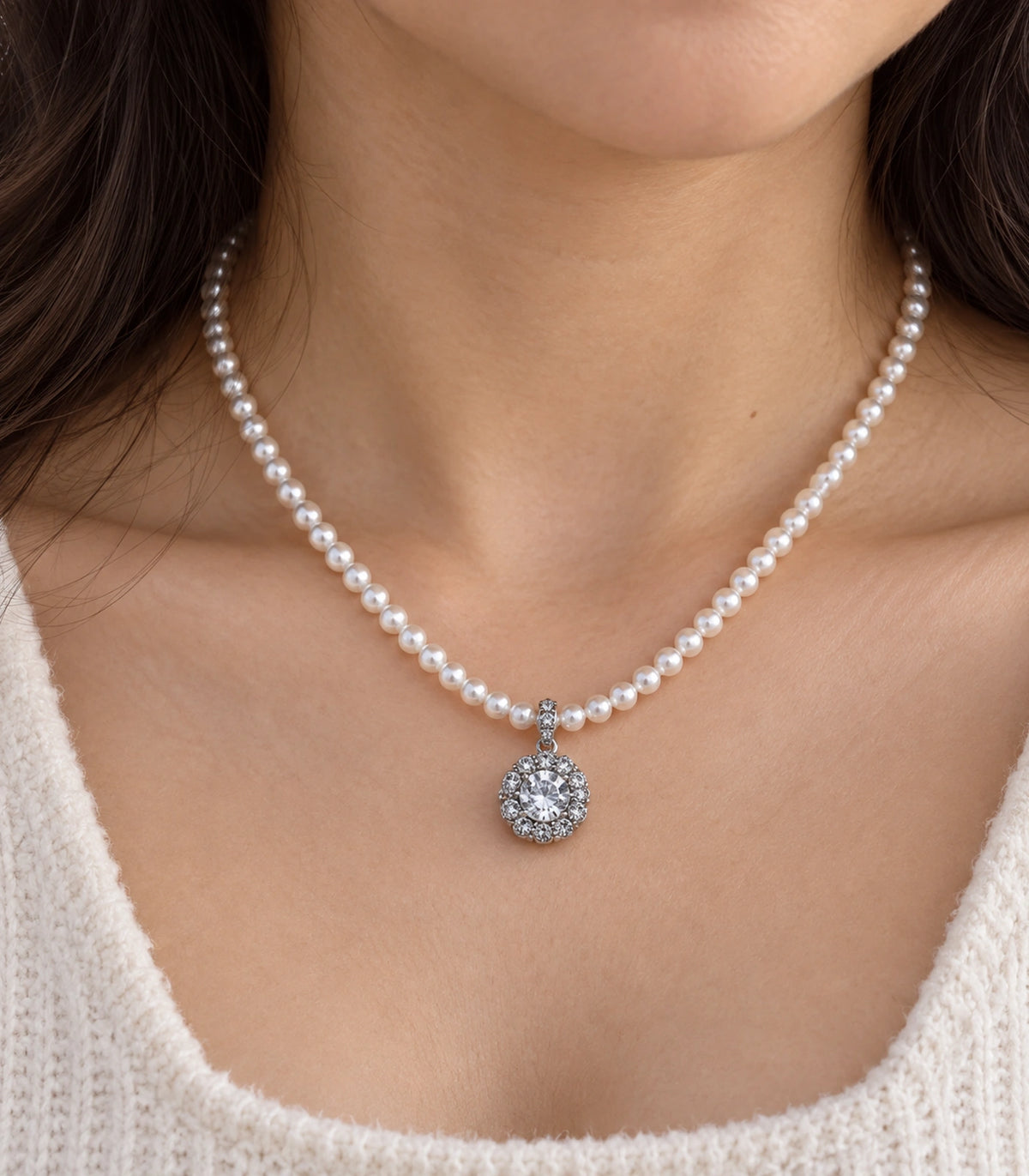 JIMIKI Silver-Tone Floral Cluster Crystal Pearl Necklace in Silver-tone / clear / white, close-up of the pendant and pearl-style strand