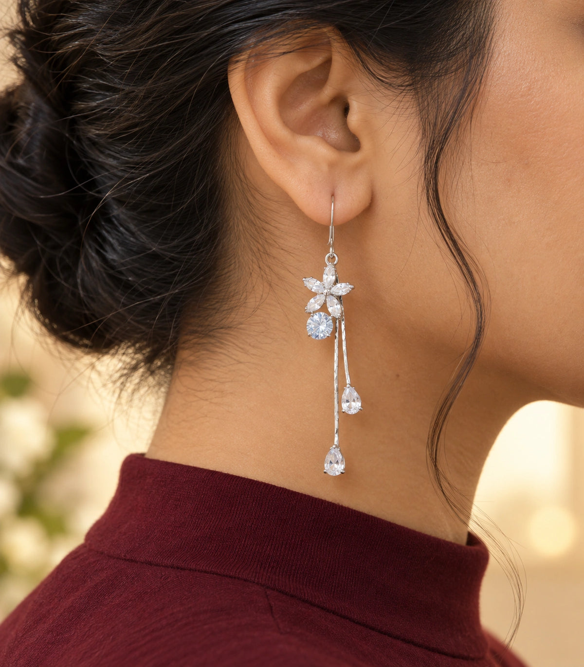 JIMIKI Silver Tone Flower Round Crystal Twin Drop Earring Pair in Silver-tone, editorial model view