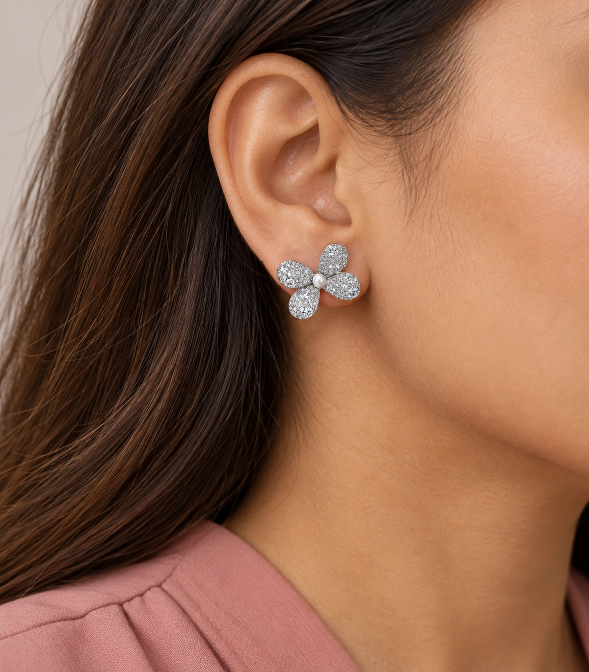JIMIKI Four Petal Pave Pearl Centre Stud Earring Pair in Silver tone, model wearing view #color_silver tone